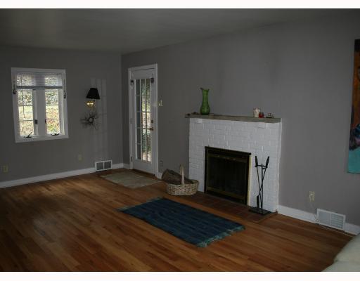 304 Washington Road Forest Hills, PA 15221 - Photo 3 of 8 Living Room. RELAX BY A FIRE IN THE COZY LIVING ROOM.