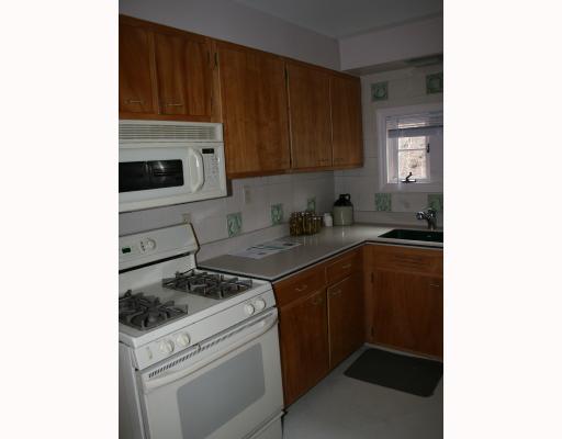 304 Washington Road Forest Hills, PA 15221 - Photo 4 of 8 Kitchen. KITCHEN IS UPDATED WITH CORIAN COUNTERTOPS AND BEAUTIFULLY TILED WALLS