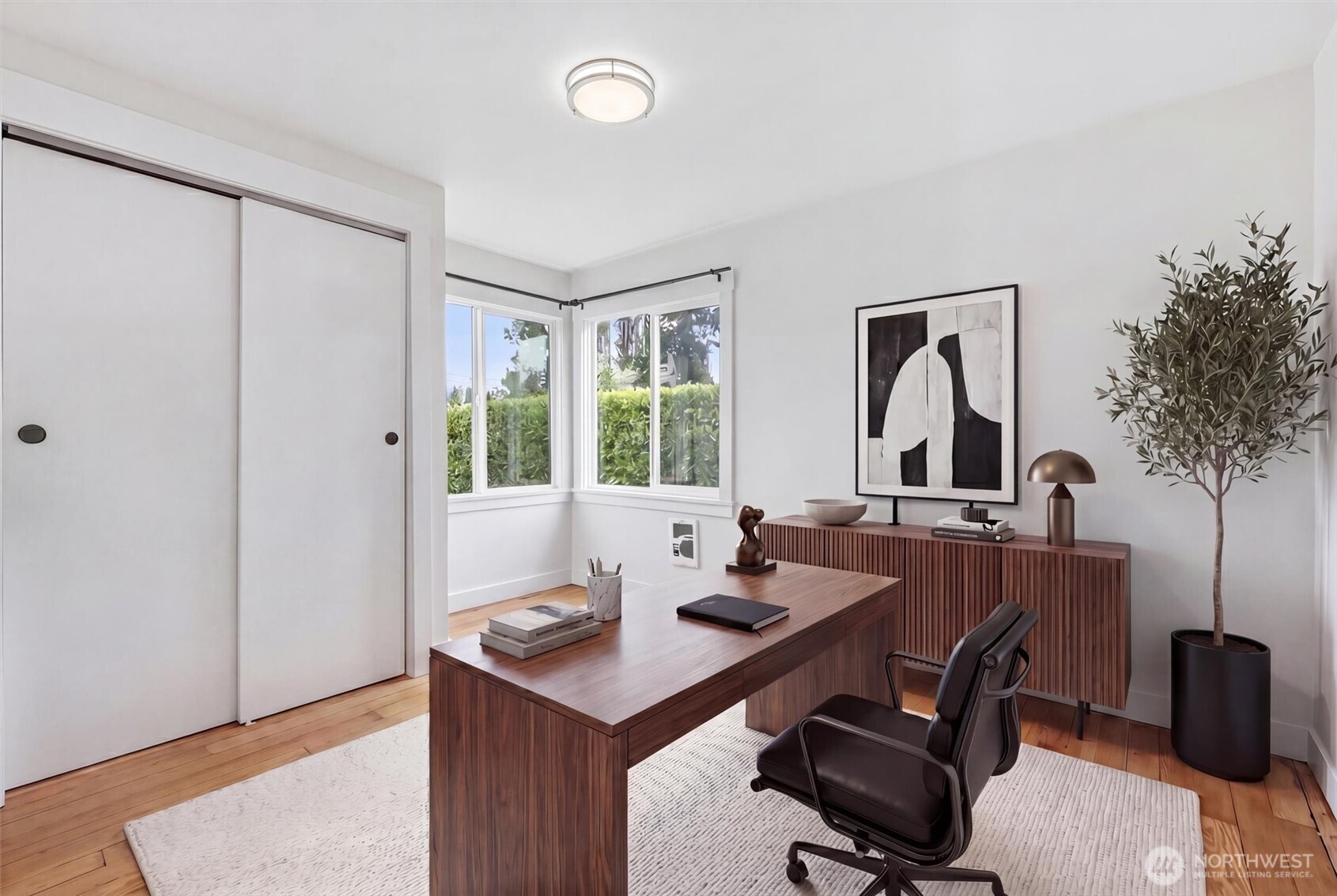 1651 Southwest 114th Street Seattle, WA 98146 - Photo 21 of 37 a view of a workspace with furniture and a window