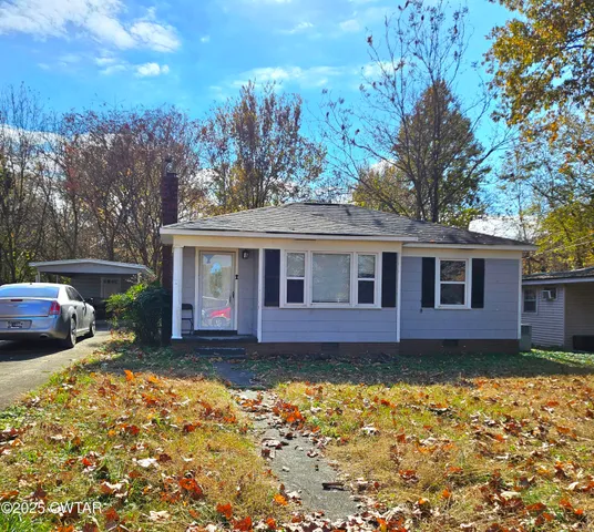 a view of a house with garden