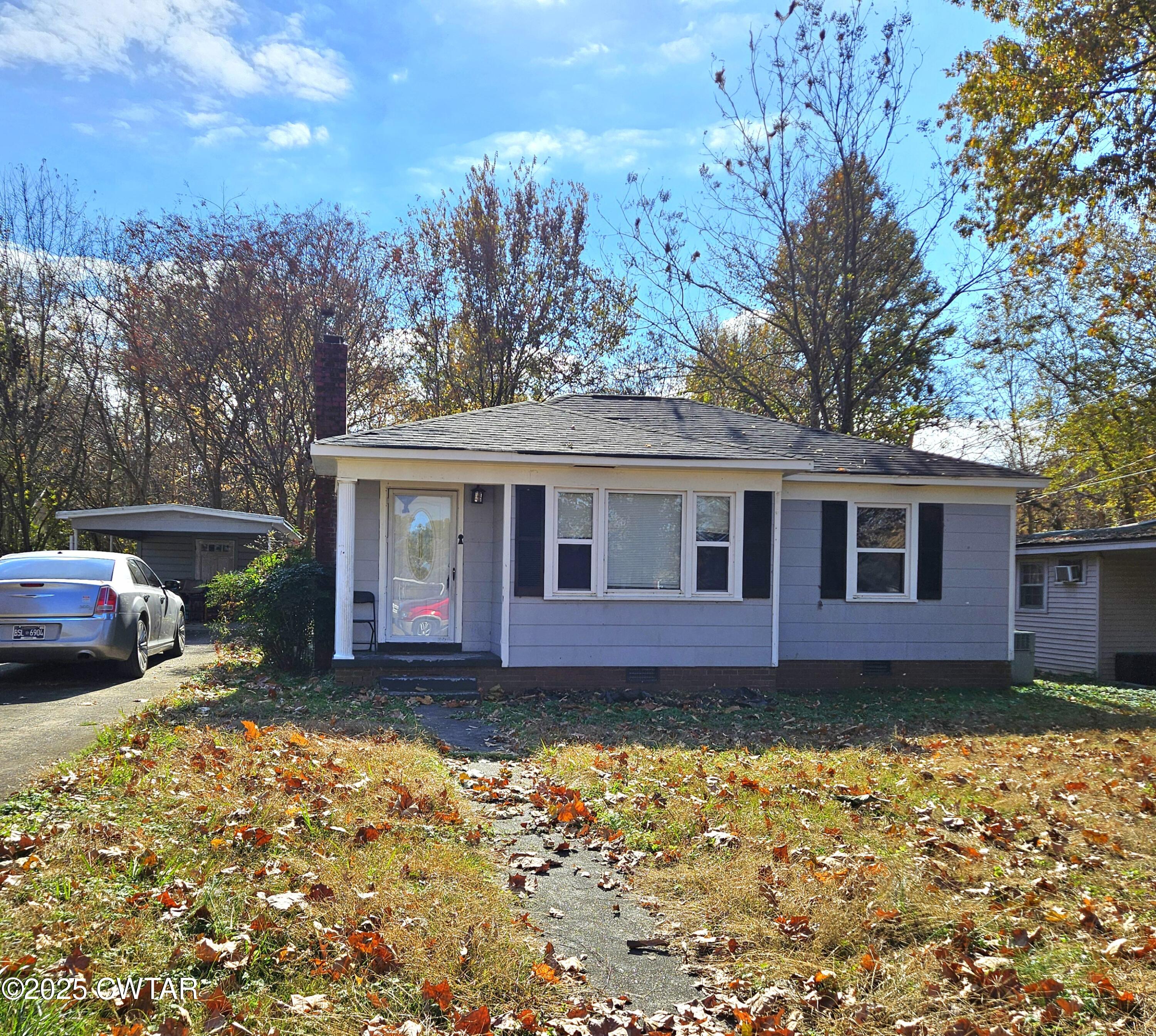 a view of a house with garden