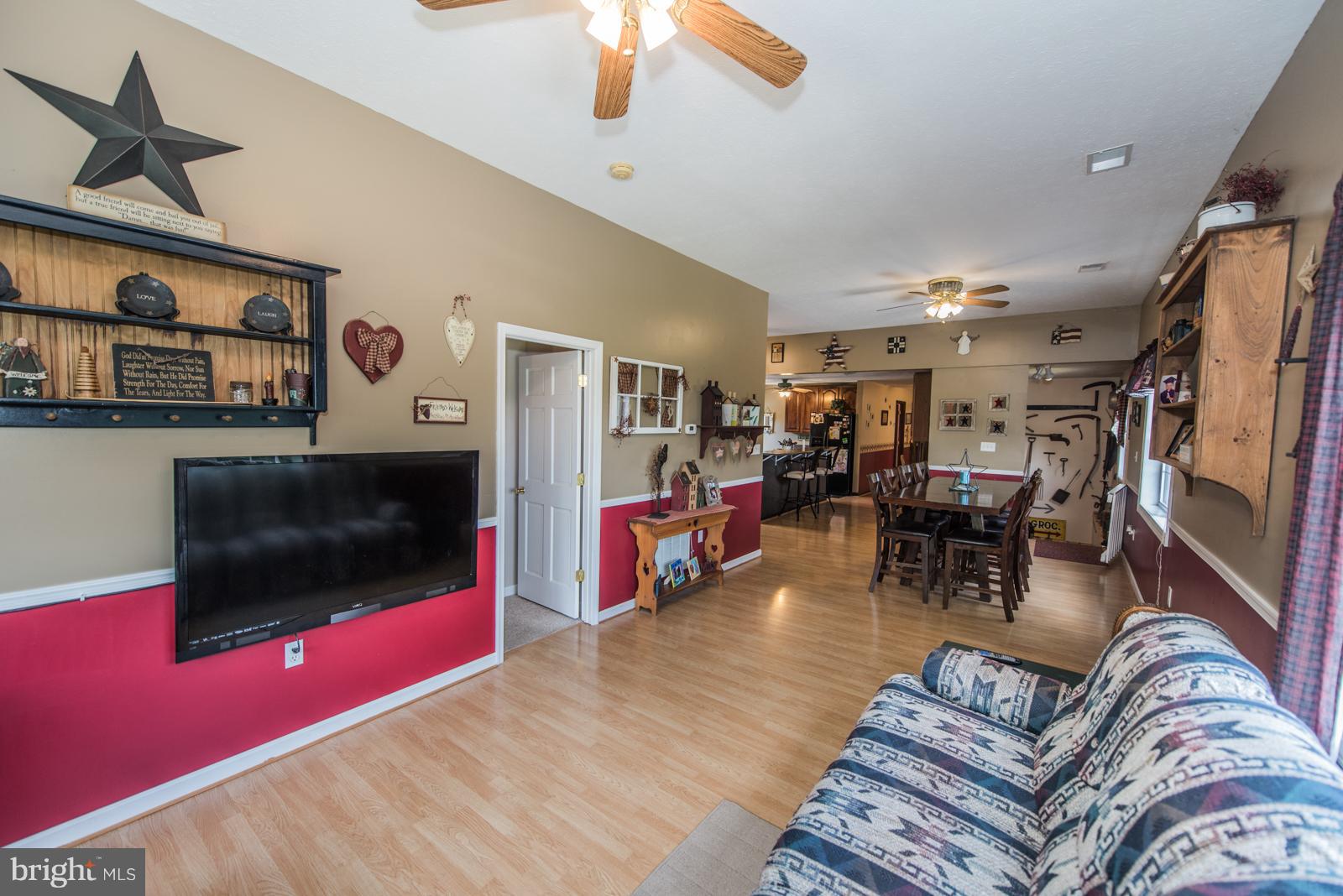 195 Messick Road Strasburg, VA 22657 - Photo 14 of 30 a living room with furniture and a flat screen tv