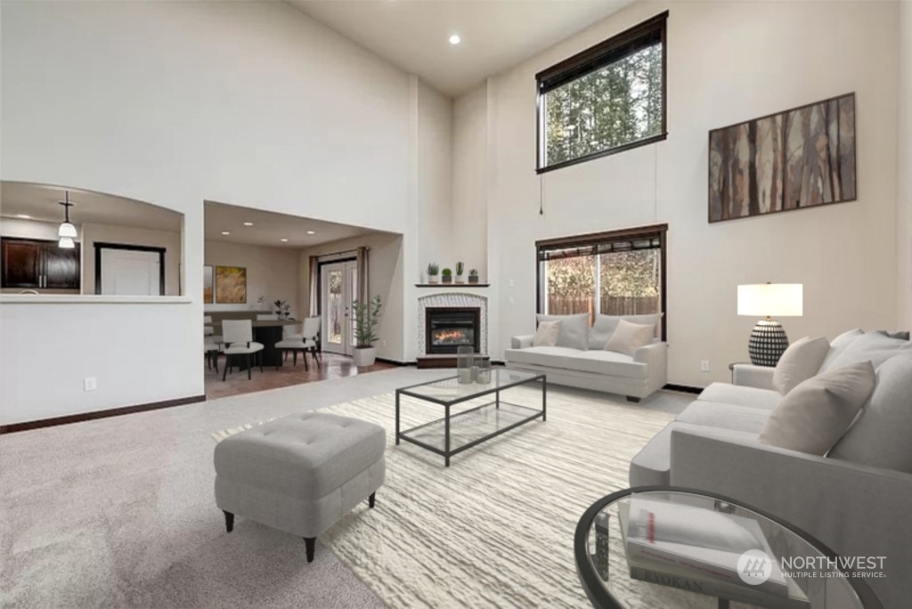 448 Barry Loop Mount Vernon, WA 98274 - Photo 11 of 40 a living room with furniture and a fireplace