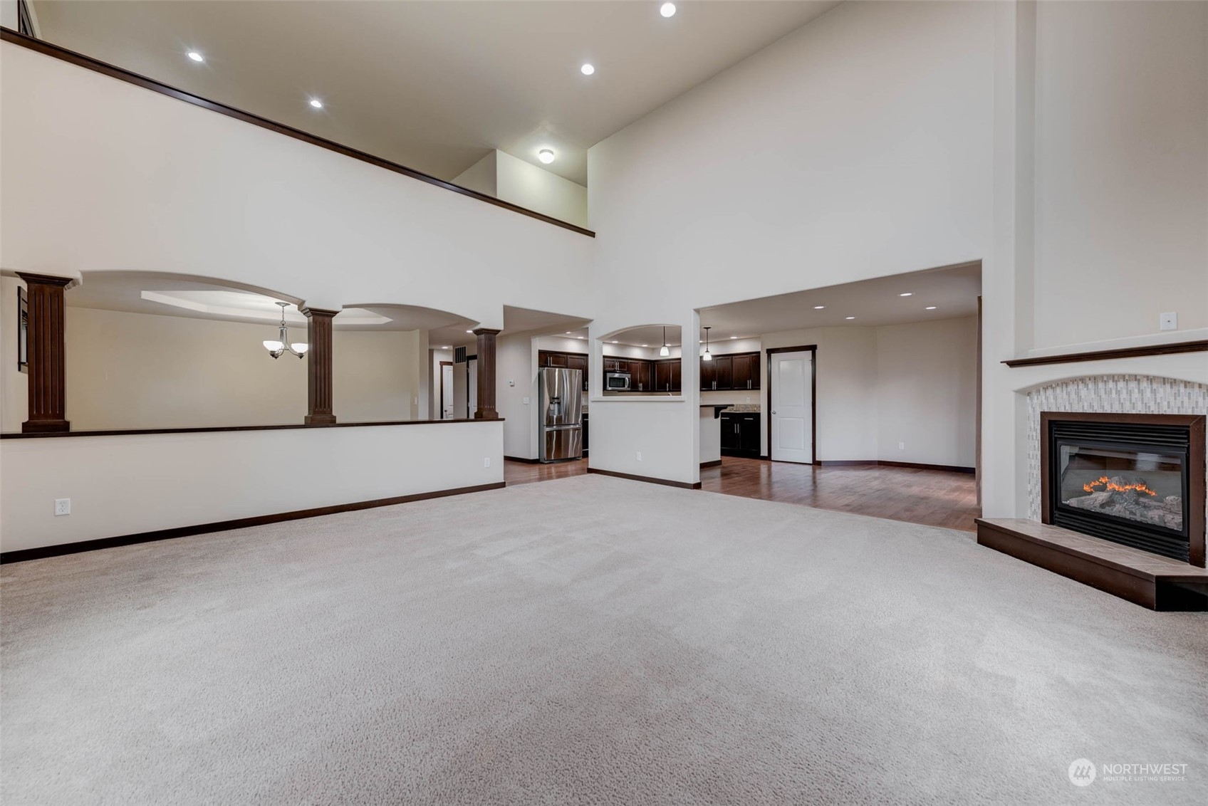 448 Barry Loop Mount Vernon, WA 98274 - Photo 12 of 40 a view of an empty room with a fireplace
