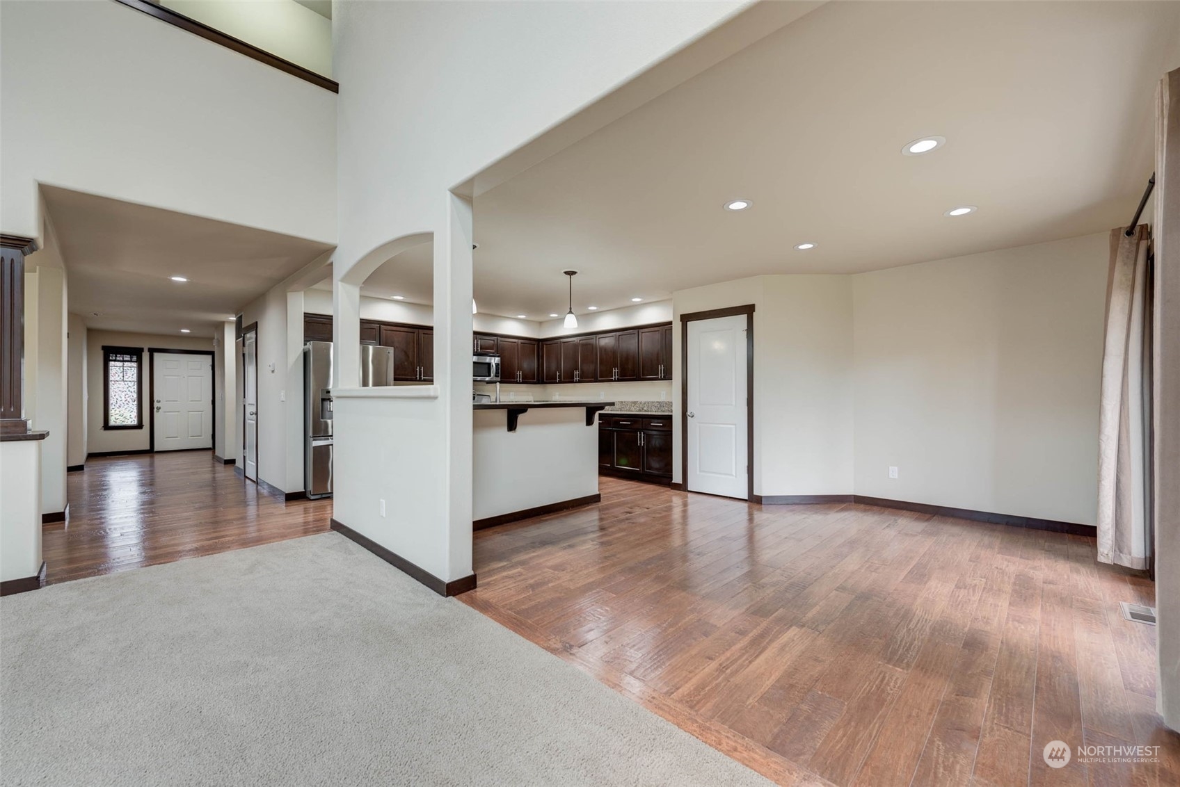 448 Barry Loop Mount Vernon, WA 98274 - Photo 13 of 40 a view of a kitchen with a sink and a stove top oven
