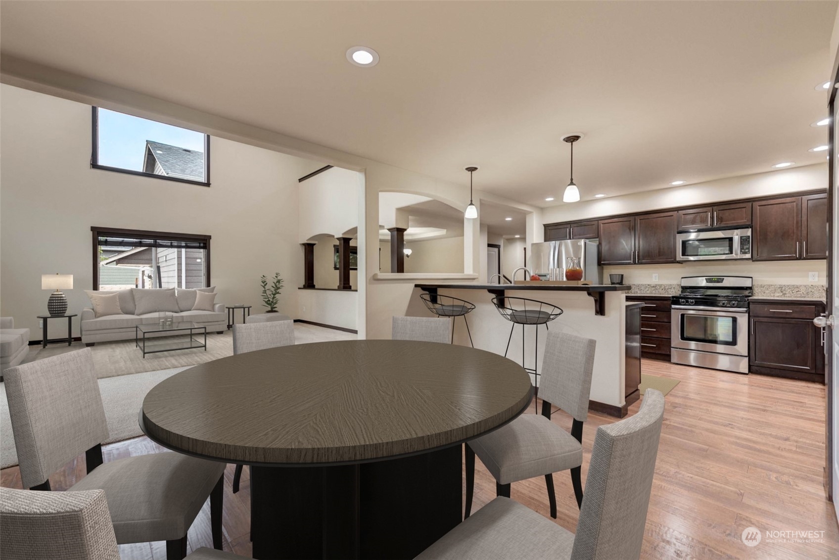 448 Barry Loop Mount Vernon, WA 98274 - Photo 15 of 40 a large kitchen with a table and chairs