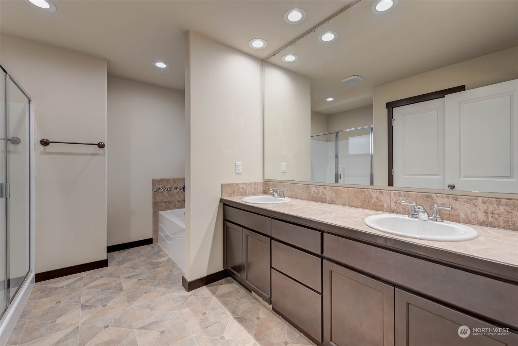 448 Barry Loop Mount Vernon, WA 98274 - Photo 26 of 40 a bathroom with a double vanity sink and mirror