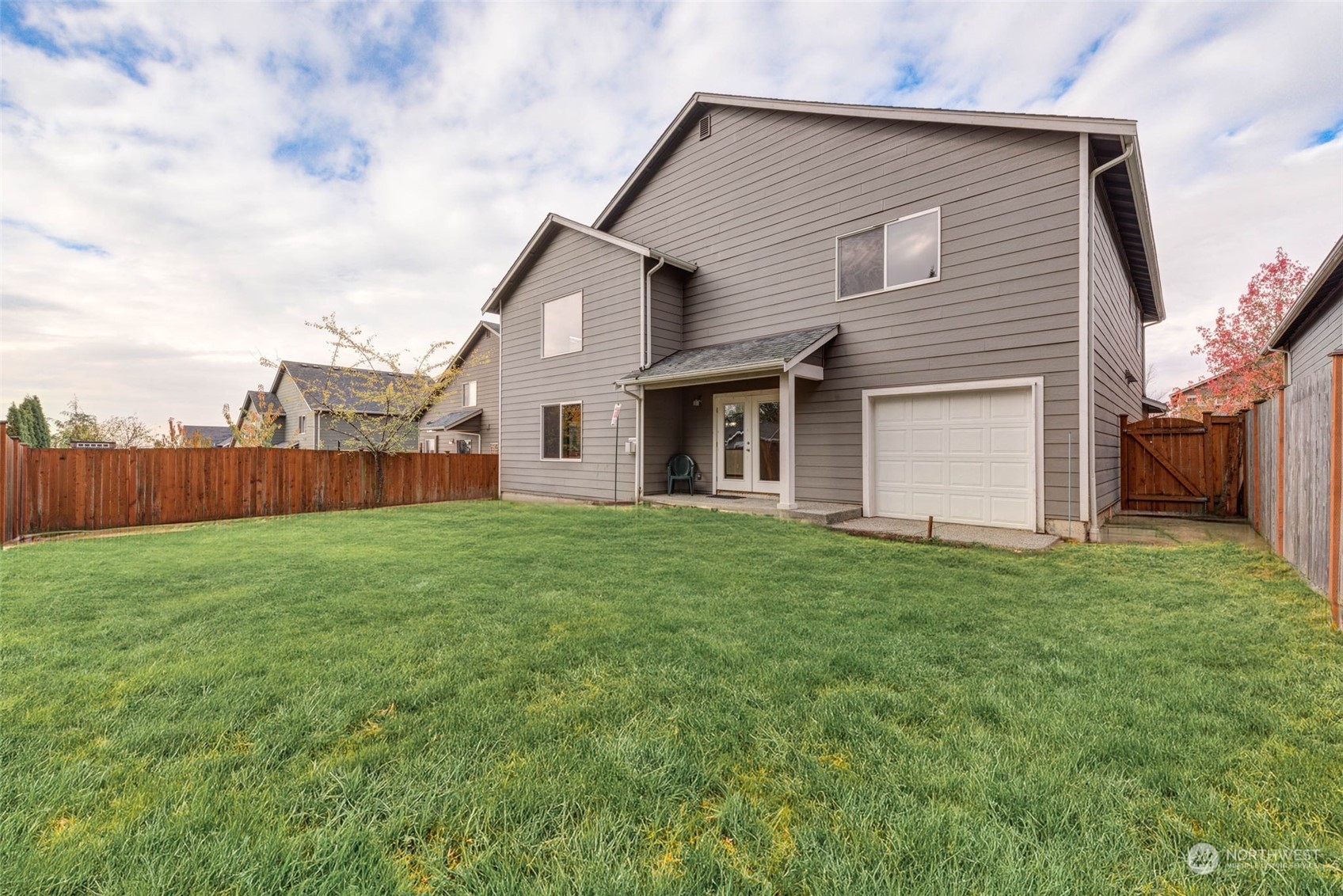 448 Barry Loop Mount Vernon, WA 98274 - Photo 37 of 40 a view of a backyard with a garden