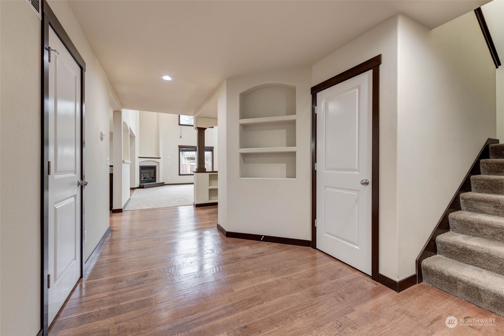 448 Barry Loop Mount Vernon, WA 98274 - Photo 7 of 40 a view of a hallway with wooden floor and entryway