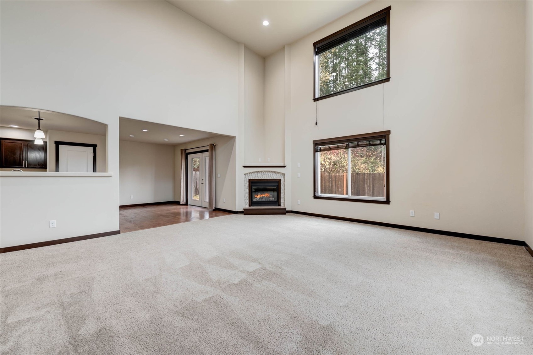 448 Barry Loop Mount Vernon, WA 98274 - Photo 10 of 40 an empty room with windows and cabinet