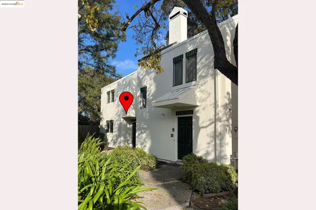 a view of a street with flowers