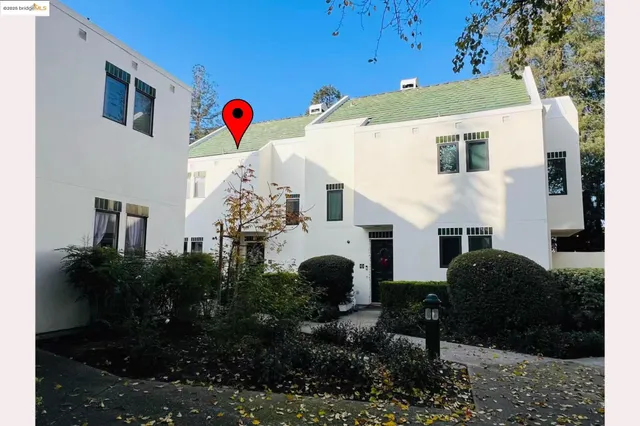 a view of front door of house and yard