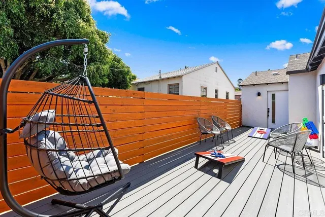 a blue bench sitting next to a blue roof deck