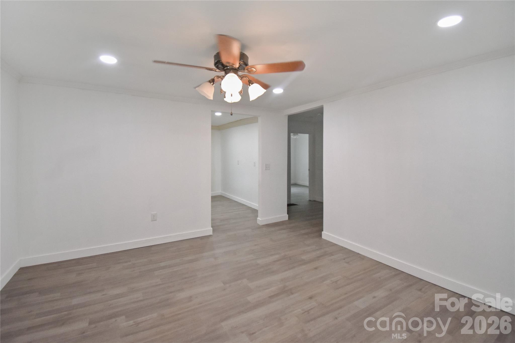 622 Green St Loop Marion, NC 28752 - Photo 7 of 16 wooden floor in an empty room with a window
