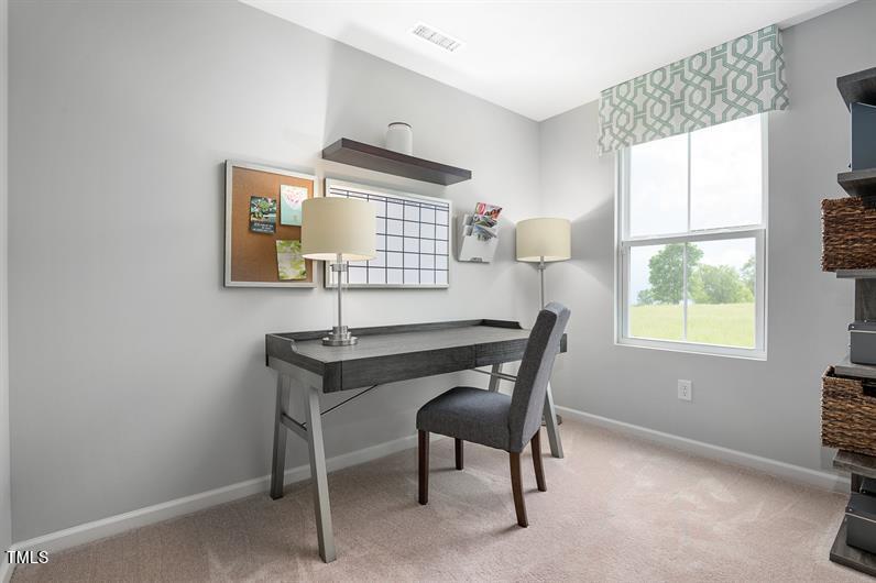 4320 Dragonfly Road Bailey, NC 27807 - Photo 5 of 10 a workspace with furniture and a window