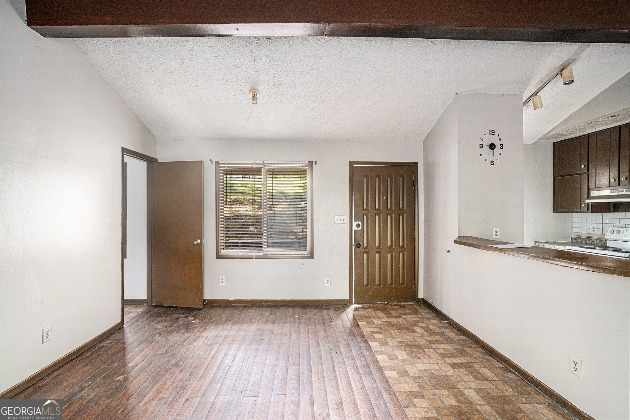1341 Bethaven Road Riverdale, GA 30296 - Photo 5 of 18 a view of a kitchen from a hallway