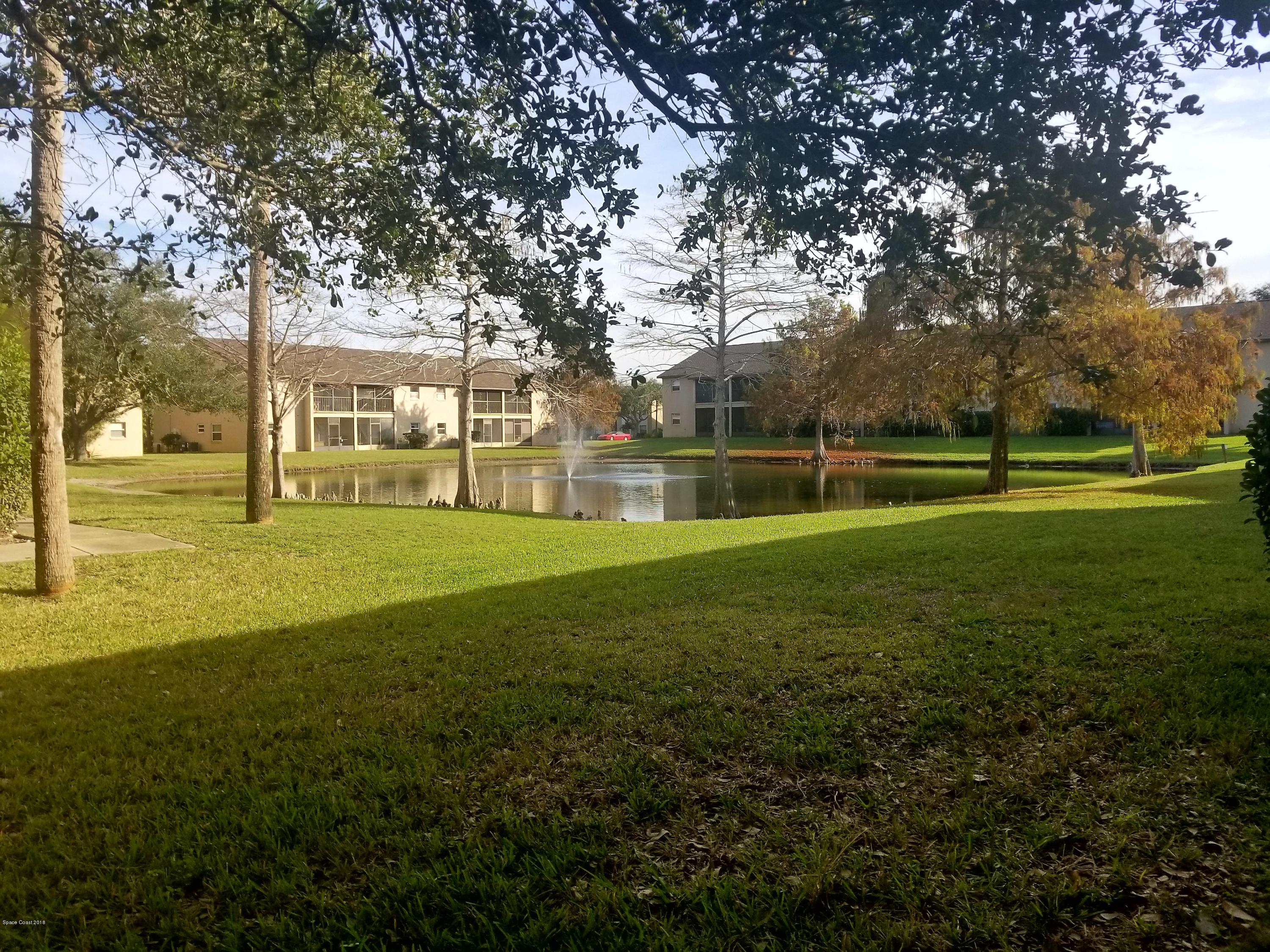 290 Spring Drive, Unit 1 Merritt Island, FL 32953 - Photo 1 of 24 View from porch