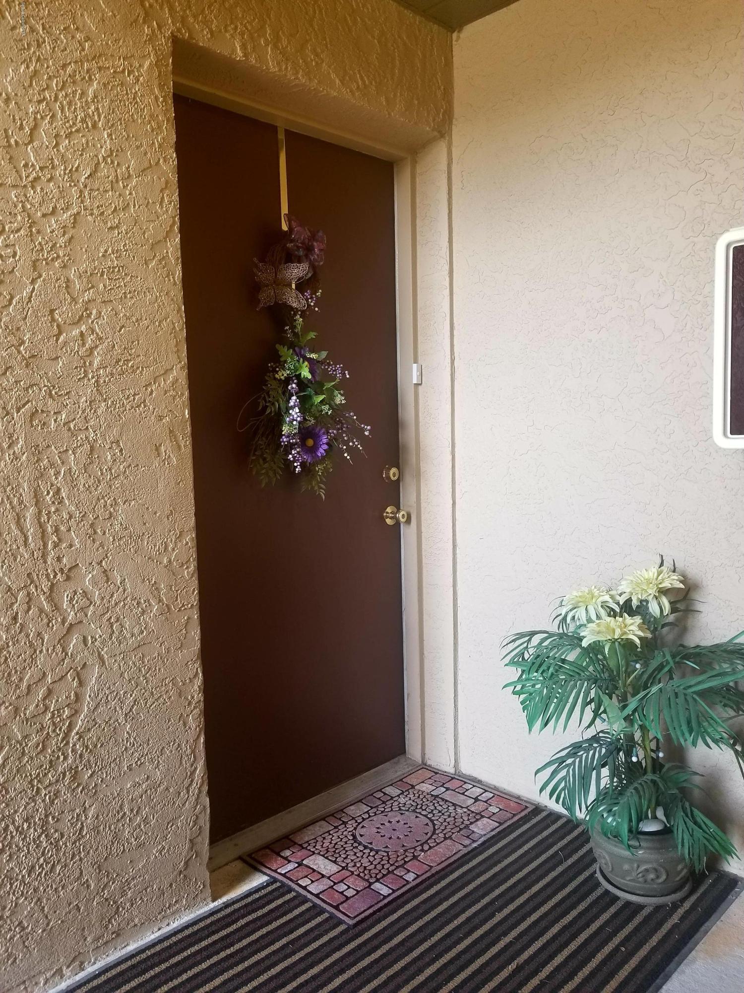 290 Spring Drive, Unit 1 Merritt Island, FL 32953 - Photo 2 of 24 Entrance