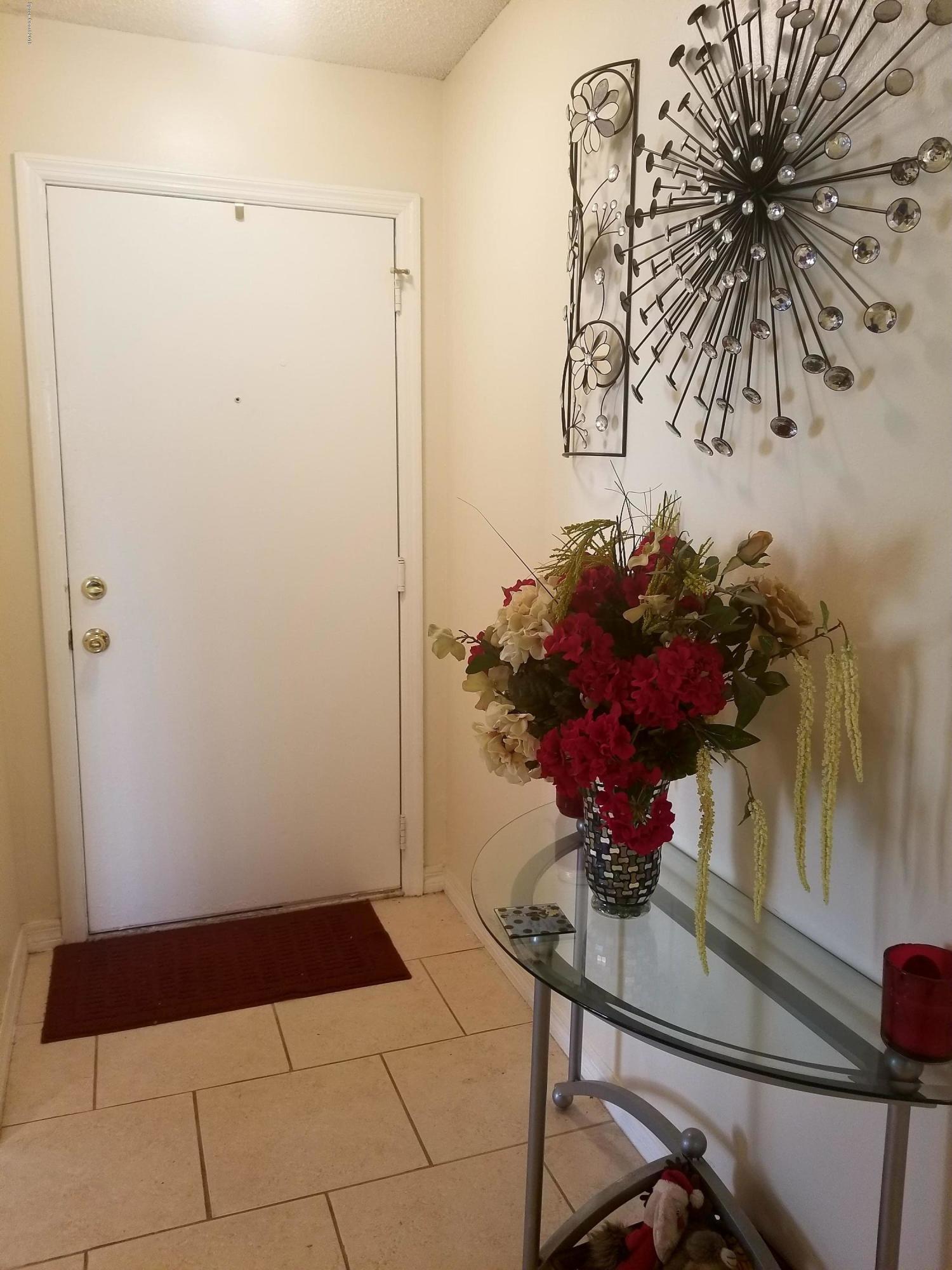 290 Spring Drive, Unit 1 Merritt Island, FL 32953 - Photo 3 of 24 Front door