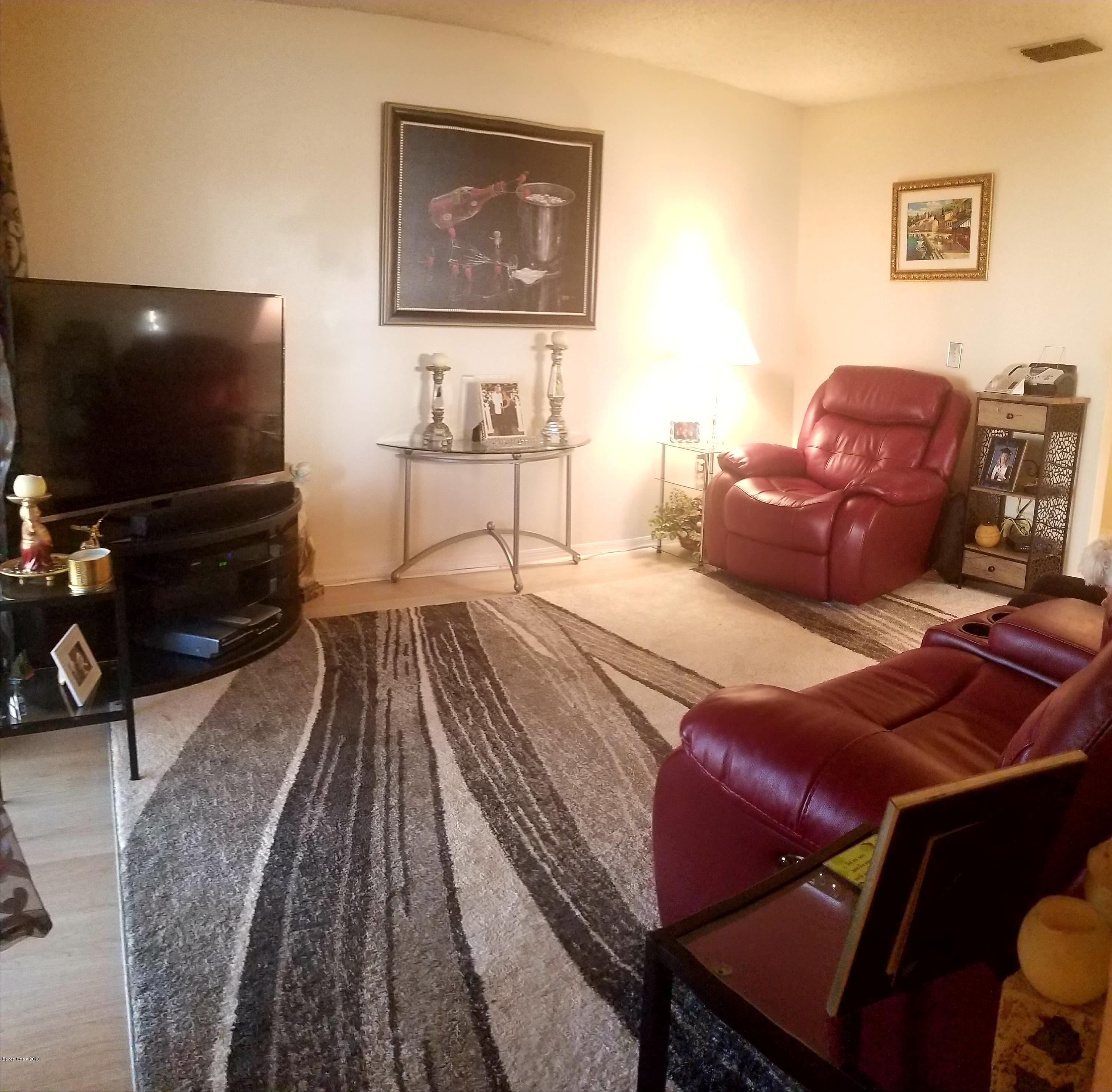 290 Spring Drive, Unit 1 Merritt Island, FL 32953 - Photo 5 of 24 Living room