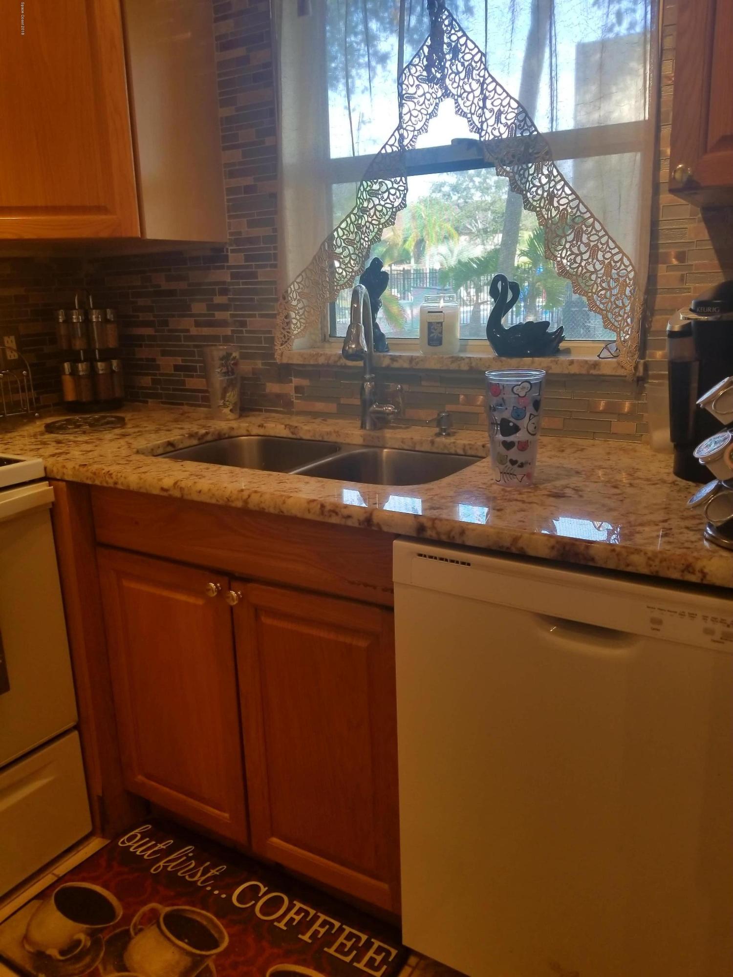 290 Spring Drive, Unit 1 Merritt Island, FL 32953 - Photo 8 of 24 Kitchen