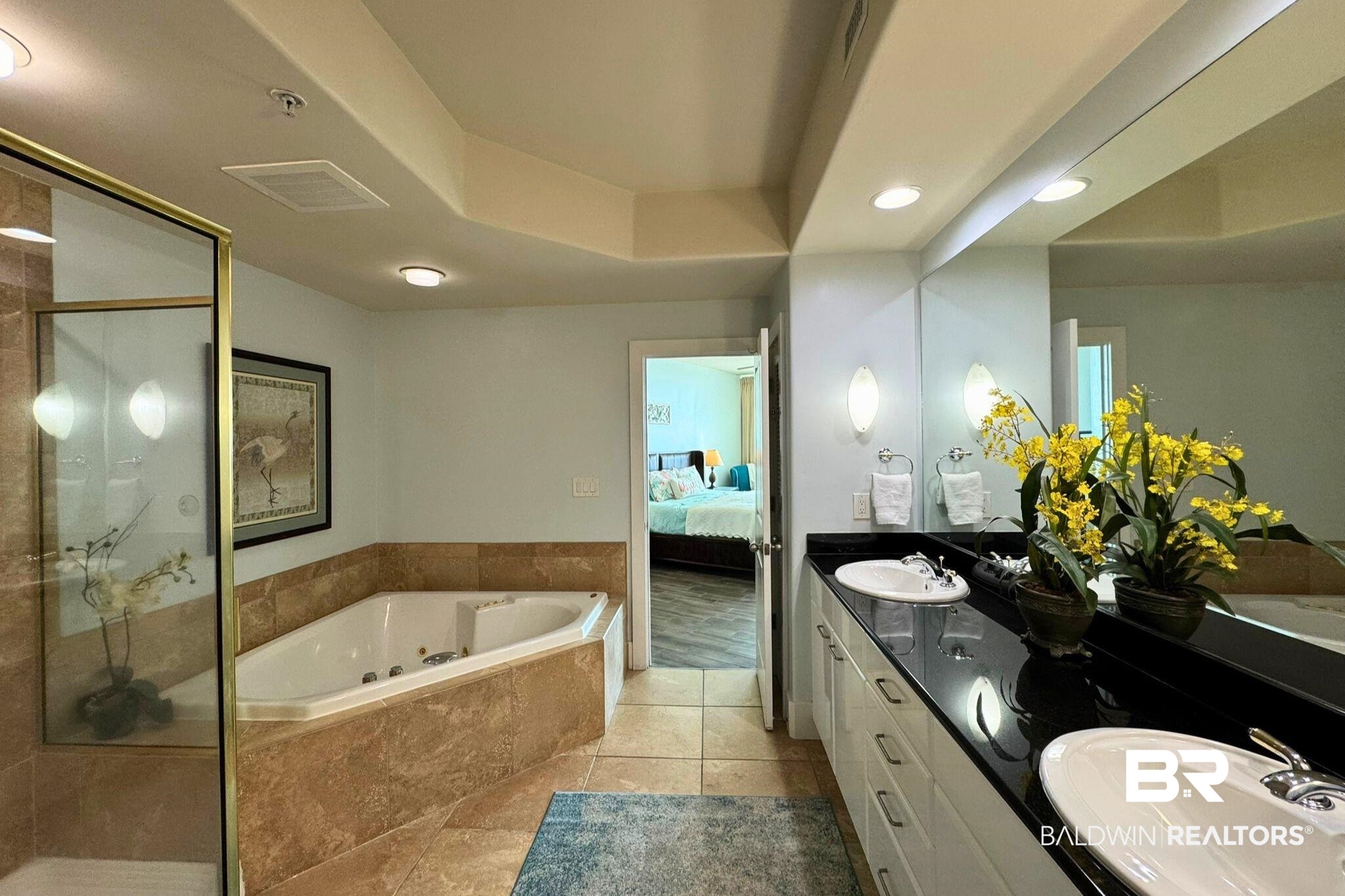 28107 Perdido Beach Boulevard, Unit D714 Orange Beach, AL 36561 - Photo 31 of 88 Full bathroom featuring a jetted tub, a sink, a shower stall, and ensuite bath