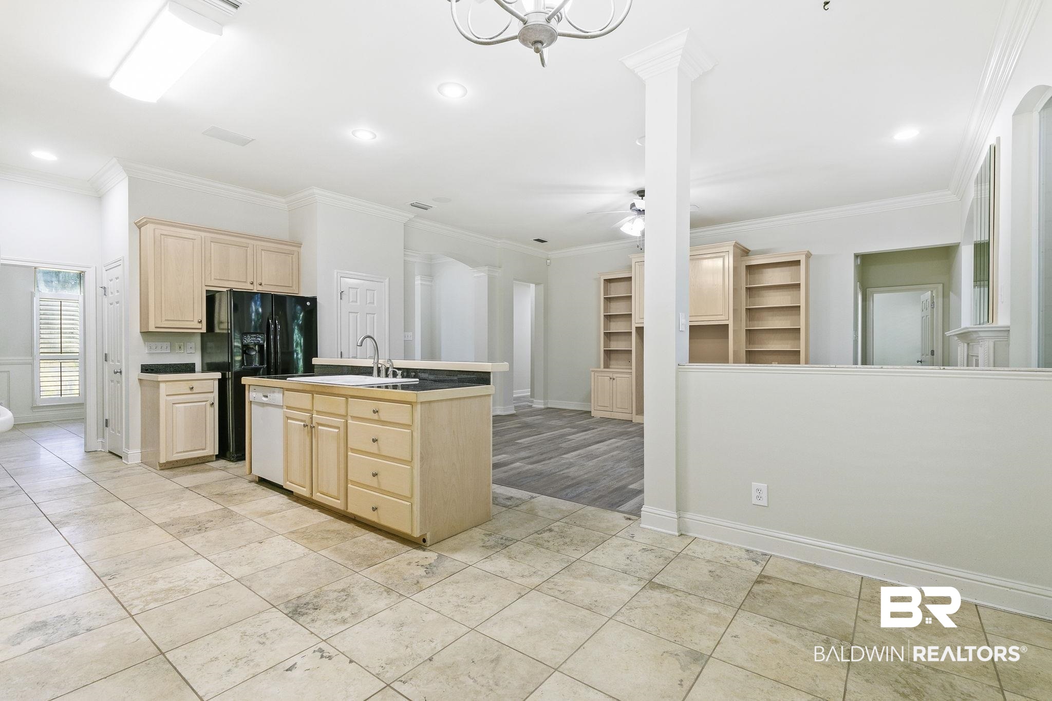 13 Bugle Retreat Daphne, AL 36527 - Photo 17 of 40 Kitchen featuring crown molding, light brown cabinetry, ceiling fan, and sink