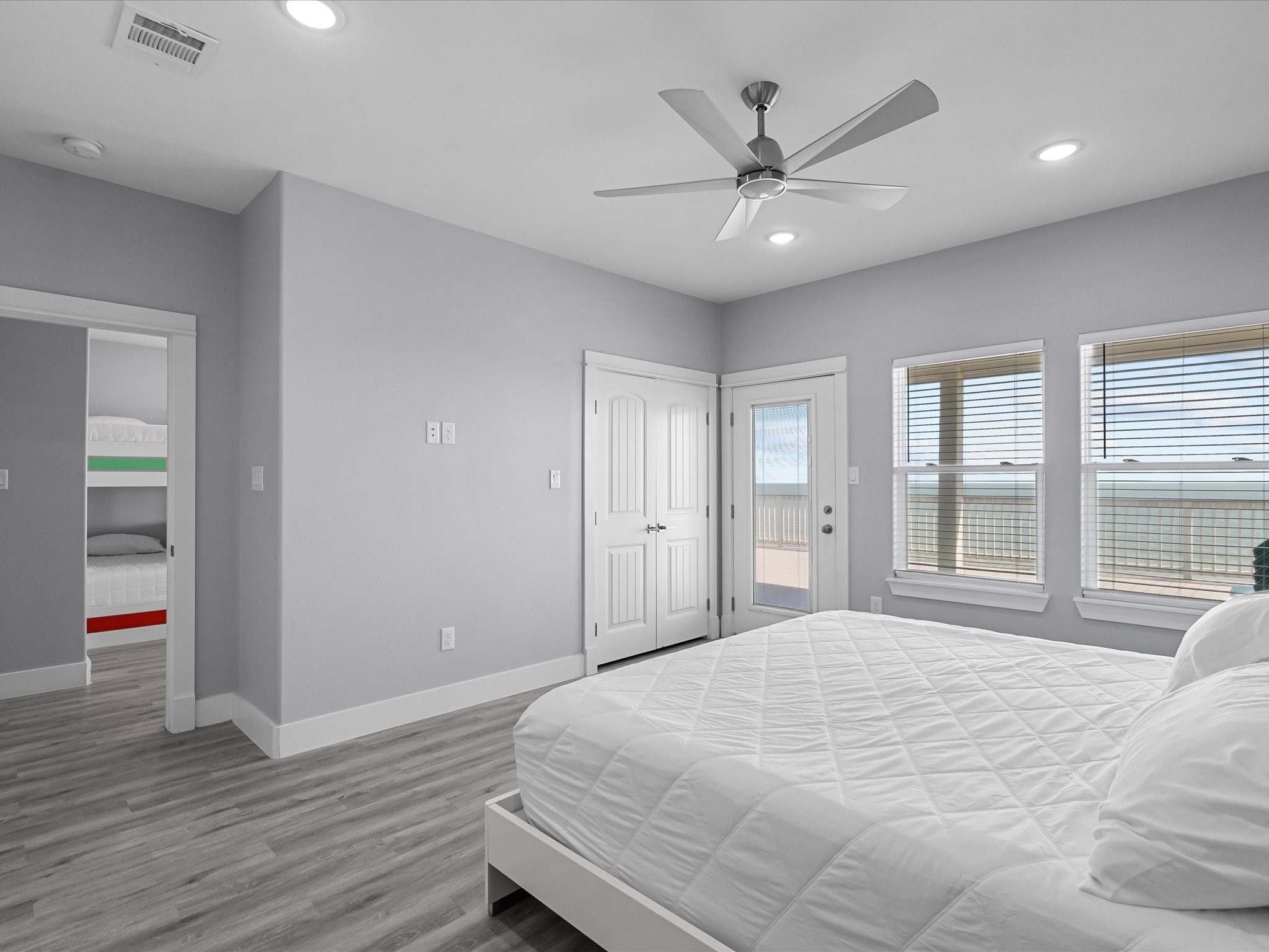 718 Beach Drive Surfside Beach, TX 77541 - Photo 40 of 49 Experience serene ocean views from this spacious, covered deck—ideal for relaxation and entertaining, with modern railings and ample space.