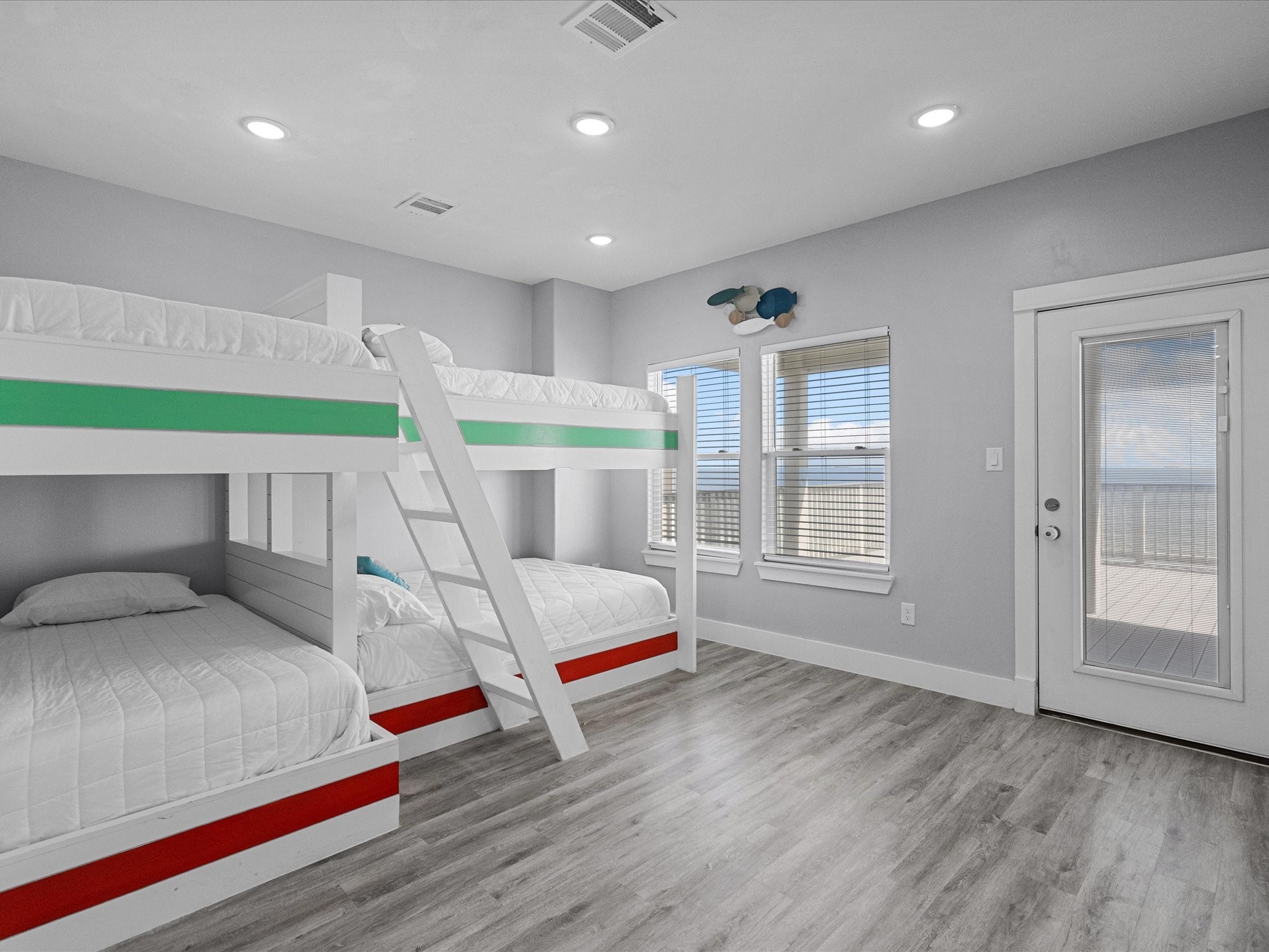 718 Beach Drive Surfside Beach, TX 77541 - Photo 41 of 49 Experience breathtaking oceanfront views from a spacious deck, ideal for relaxation and soaking in the tranquil waterfront scenery.