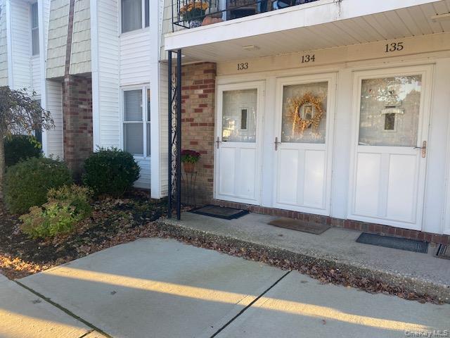 75 Rocky Point Yaphank Road, Unit 133 Rocky Point, NY 11778 - Photo 4 of 15 a view of a door of the house