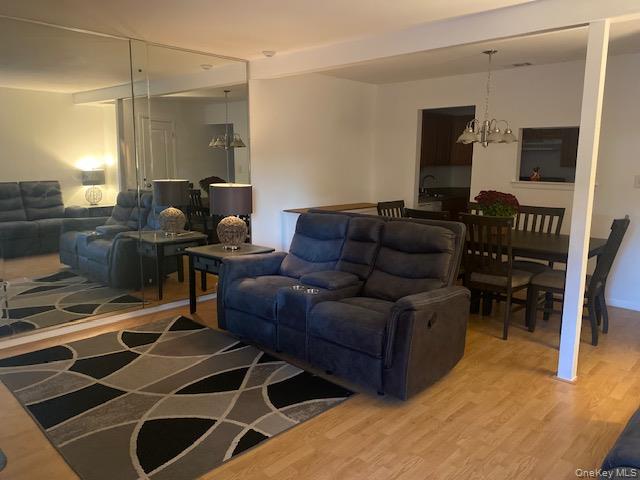 75 Rocky Point Yaphank Road, Unit 133 Rocky Point, NY 11778 - Photo 5 of 15 a living room with furniture