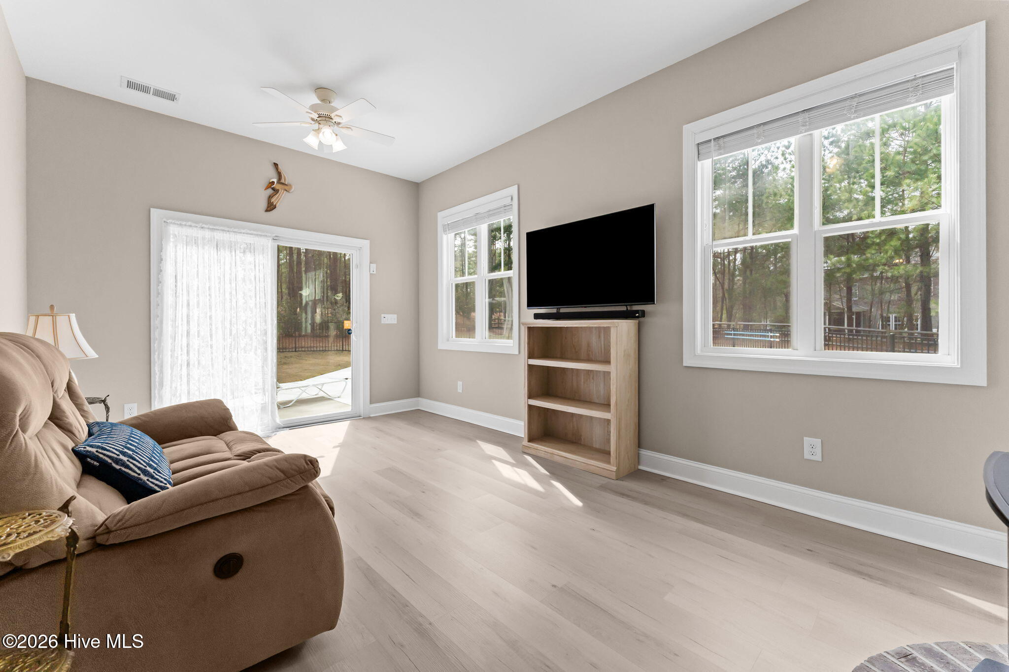 102 Roxburgh Court West End, NC 27376 - Photo 19 of 52 sunroom