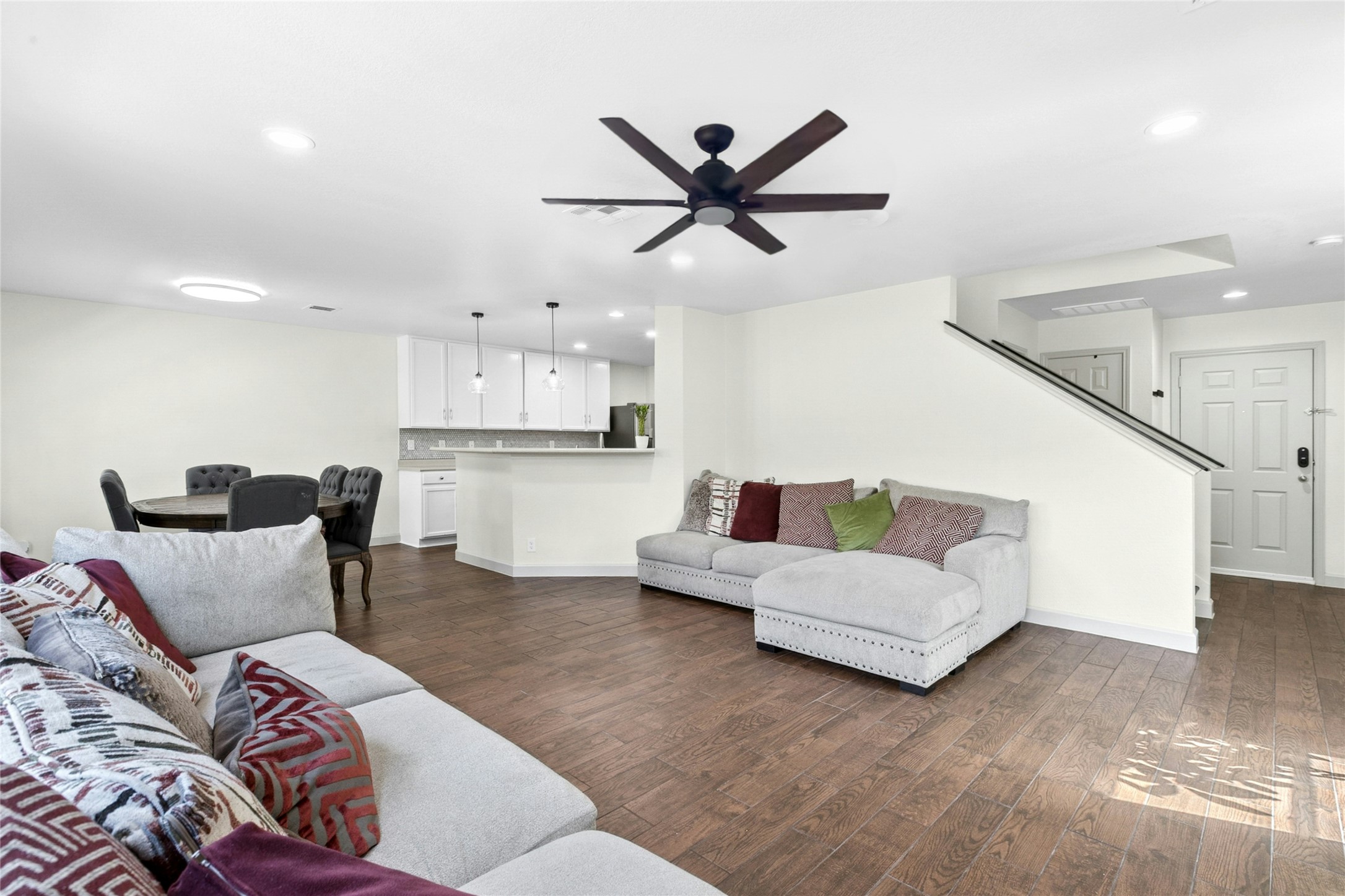 245 Myrtle Street Kyle, TX 78640 - Photo 5 of 24 Living area featuring dark wood-style floors, ceiling fan, and recessed lighting