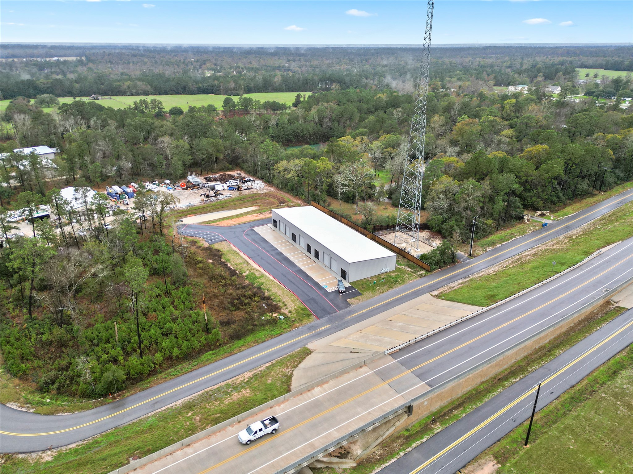 18417 Keenan Cut Off Road Montgomery, TX 77316 - Photo 11 of 15 a view of a lake with a city view