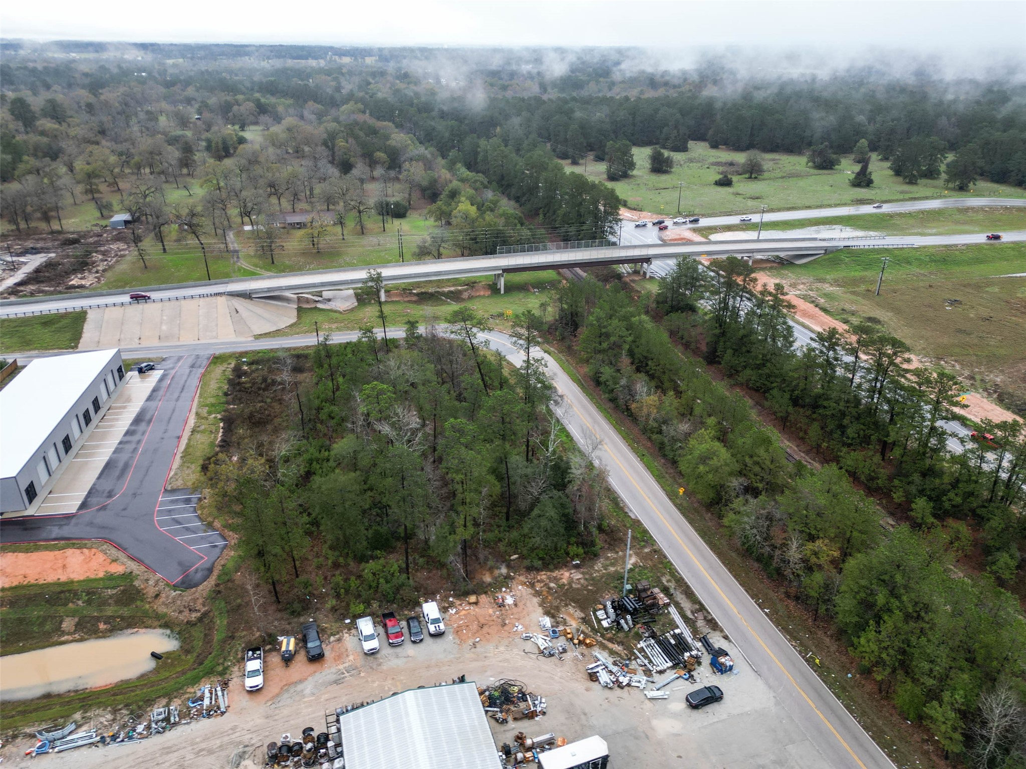 18417 Keenan Cut Off Road Montgomery, TX 77316 - Photo 14 of 15 an aerial view of a residential houses and outdoor space