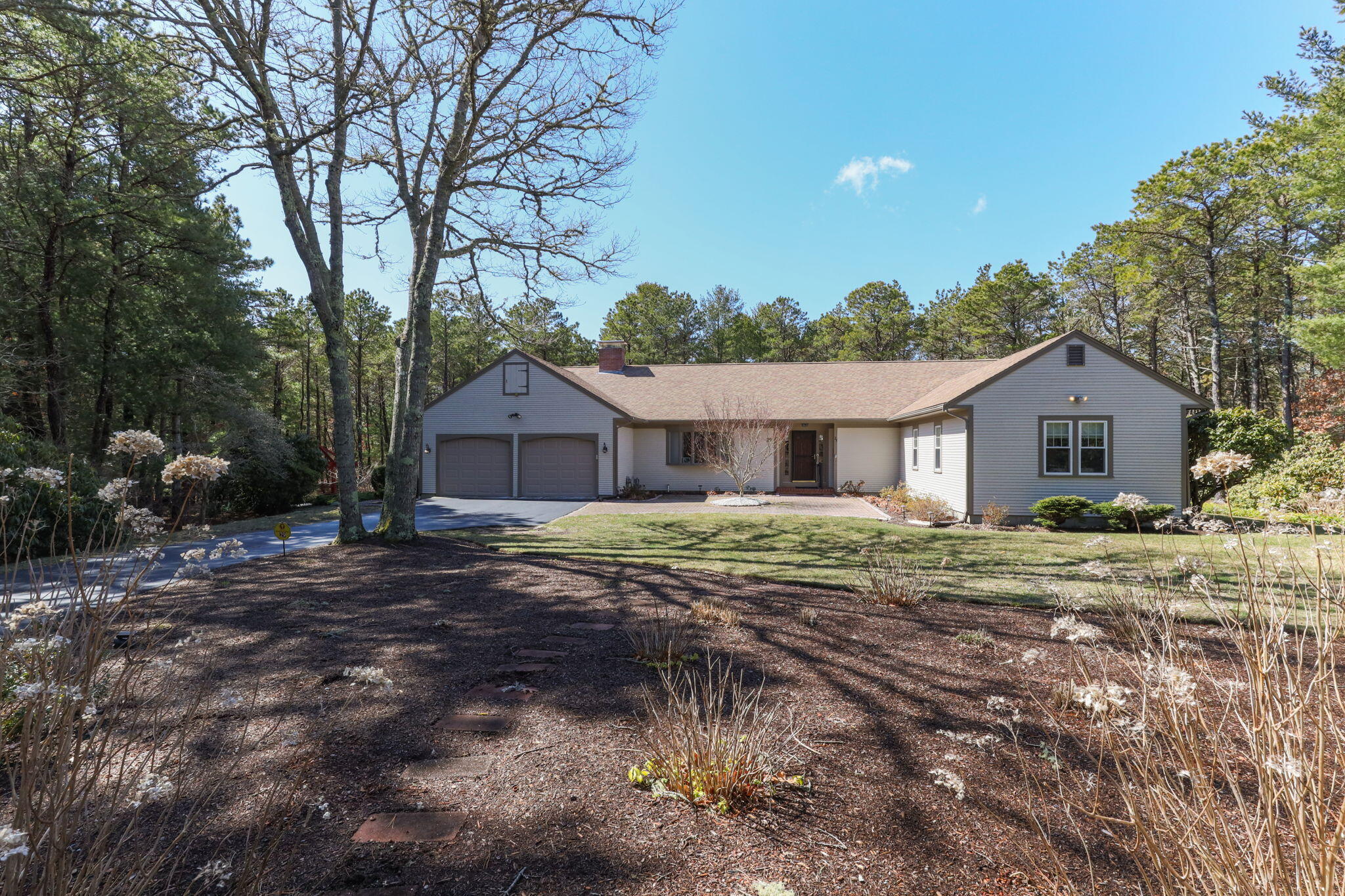a front view of a house with garden