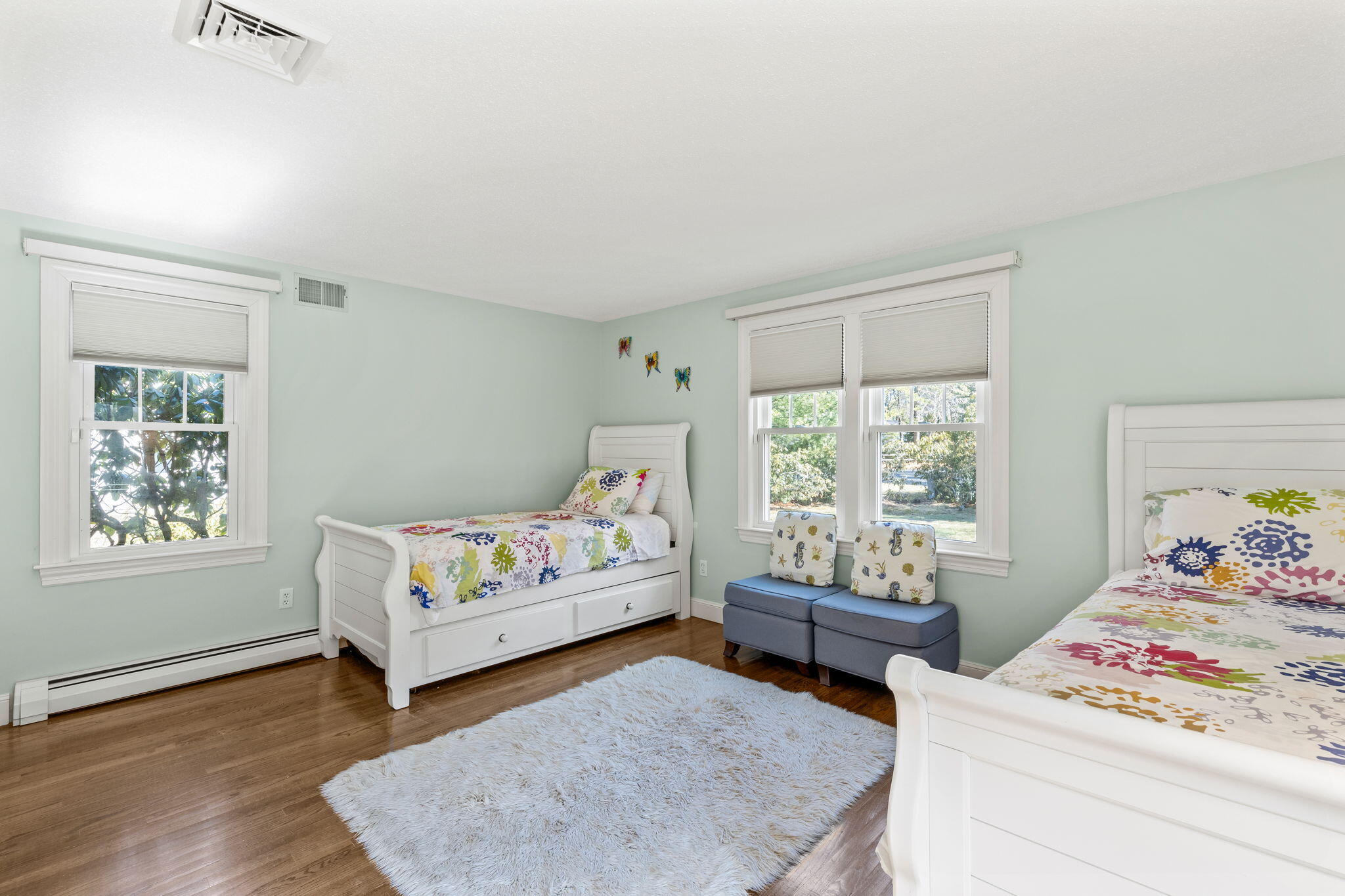 29 Amanda Court Cotuit, MA 02635 - Photo 21 of 45 a living room with baby crib furniture and a window