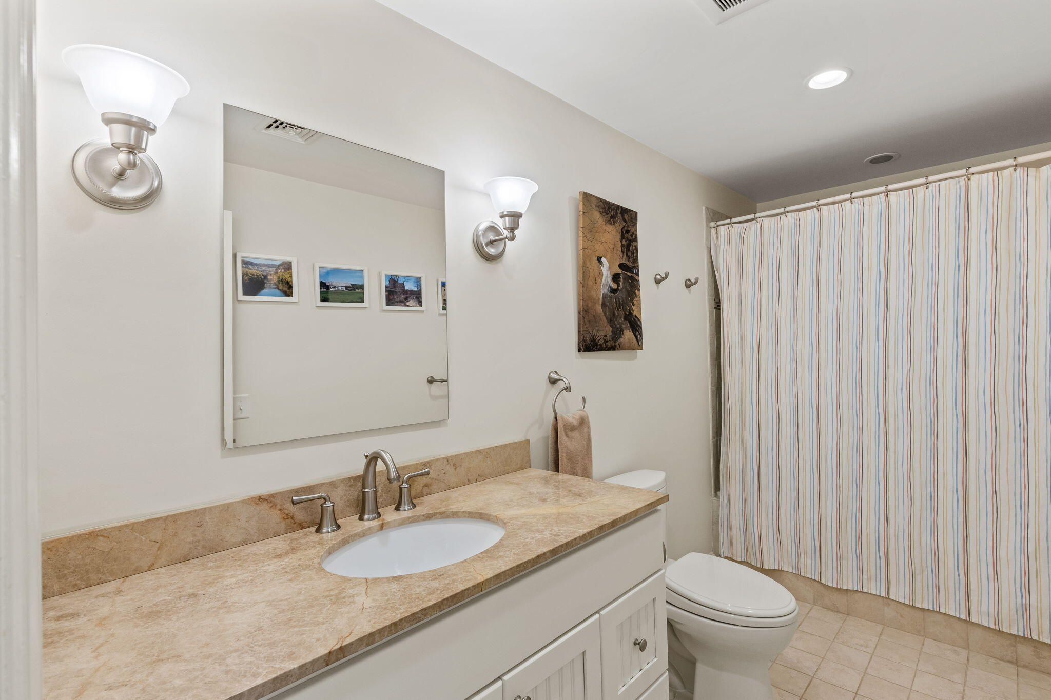 29 Amanda Court Cotuit, MA 02635 - Photo 23 of 45 a bathroom with a granite countertop sink a toilet and a mirror