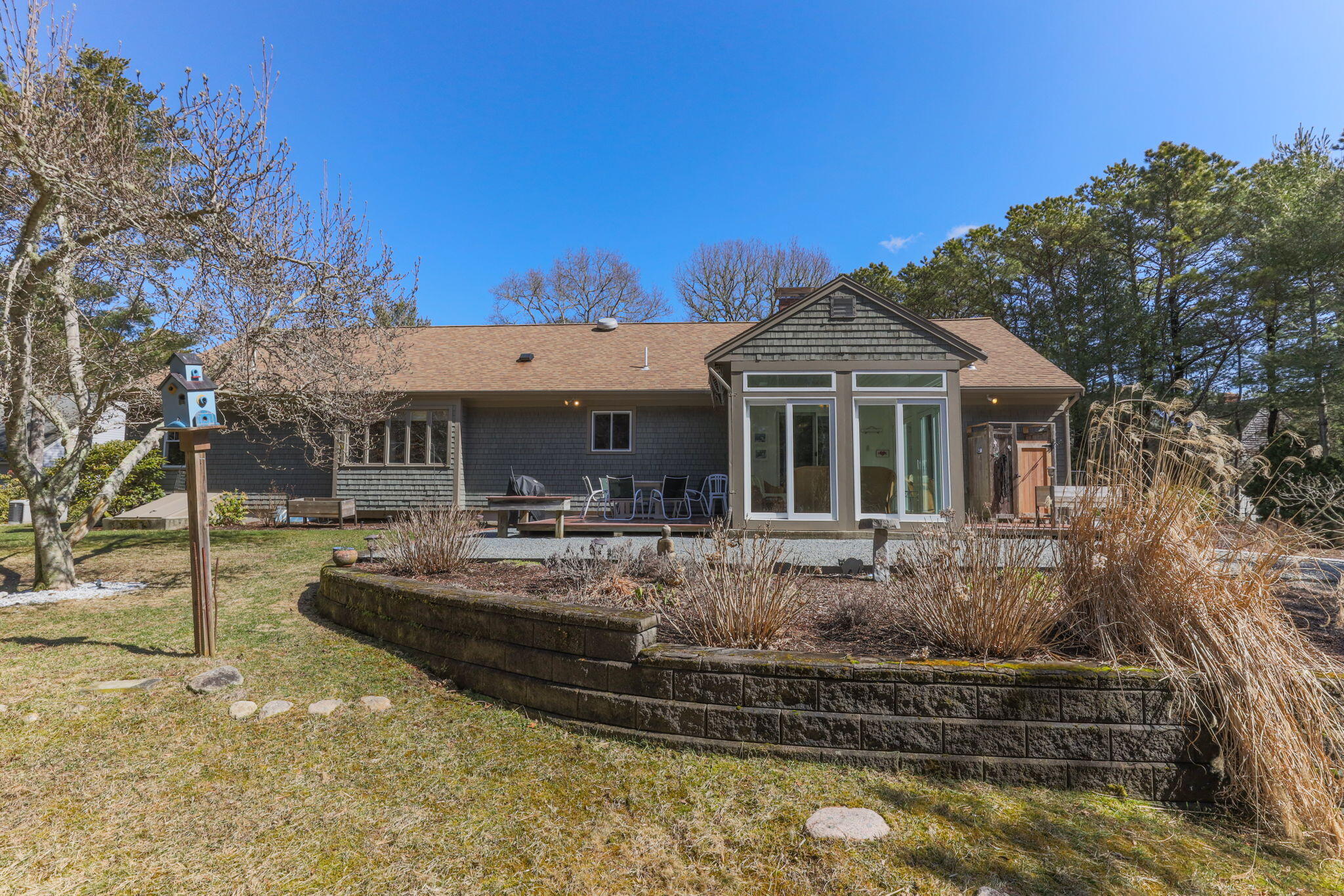 29 Amanda Court Cotuit, MA 02635 - Photo 31 of 45 a front view of a house with swimming pool