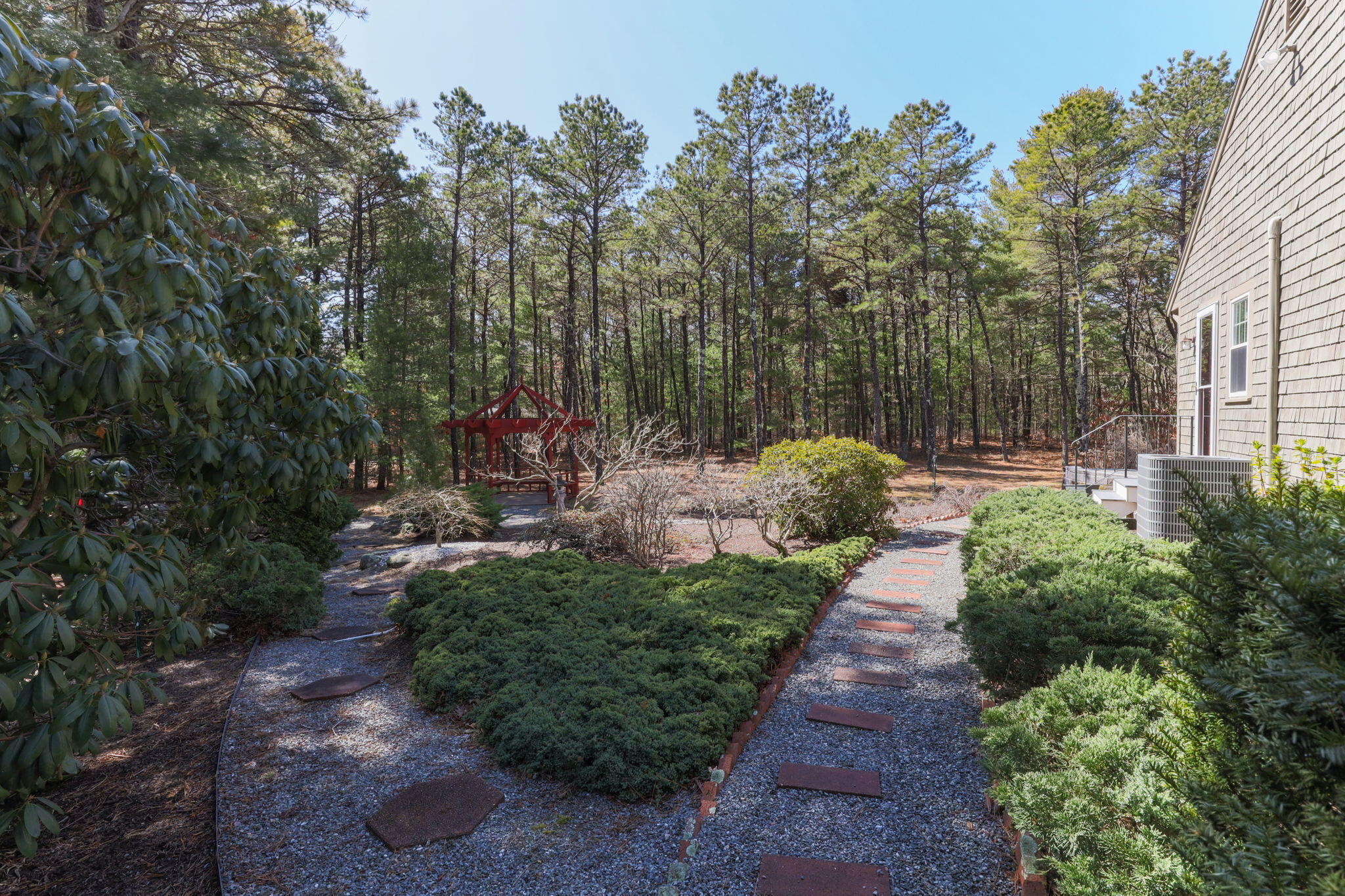 29 Amanda Court Cotuit, MA 02635 - Photo 32 of 45 a view of a backyard with sitting area