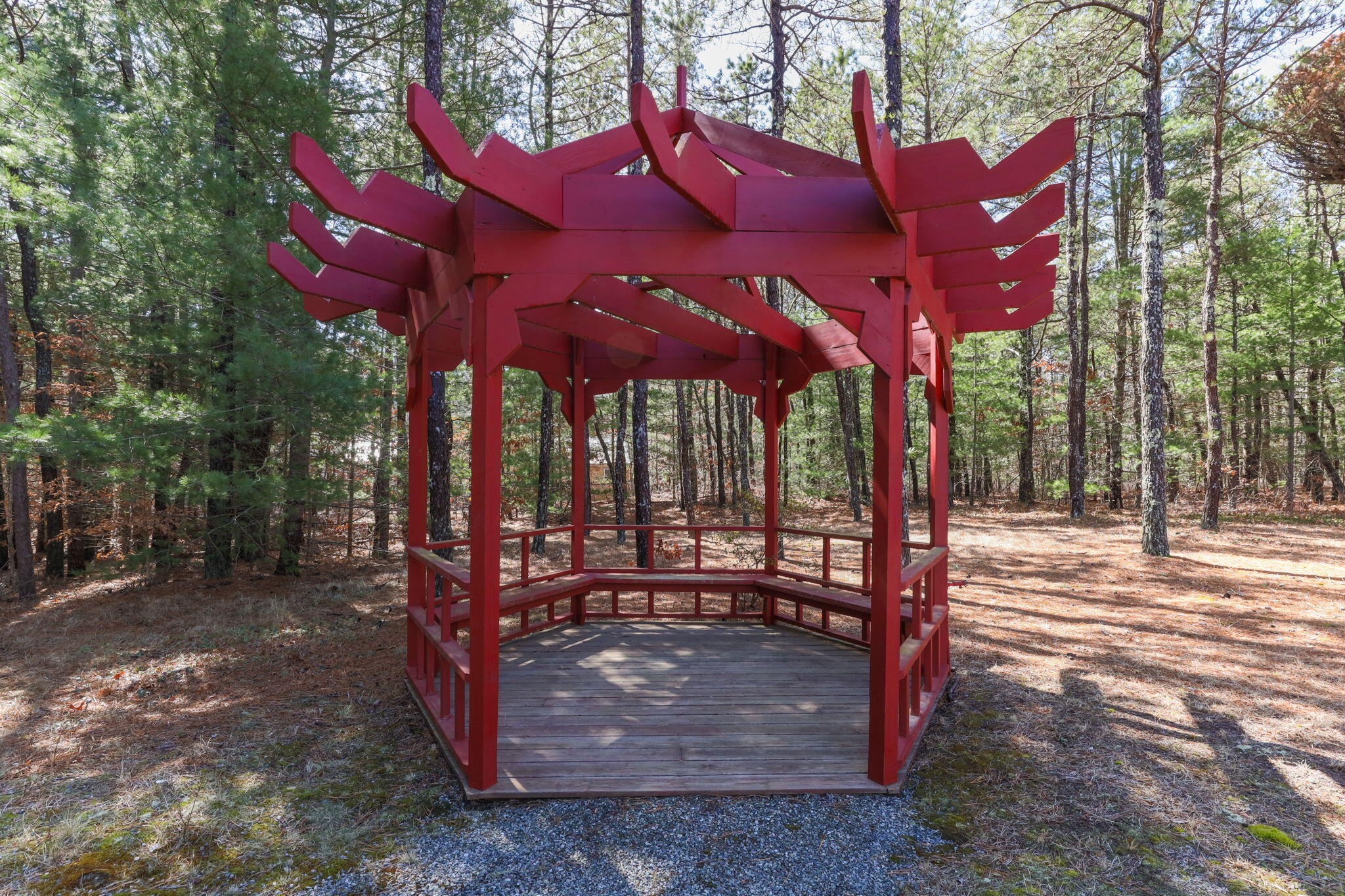 29 Amanda Court Cotuit, MA 02635 - Photo 35 of 45 a view of a patio with a table and chairs under an umbrella