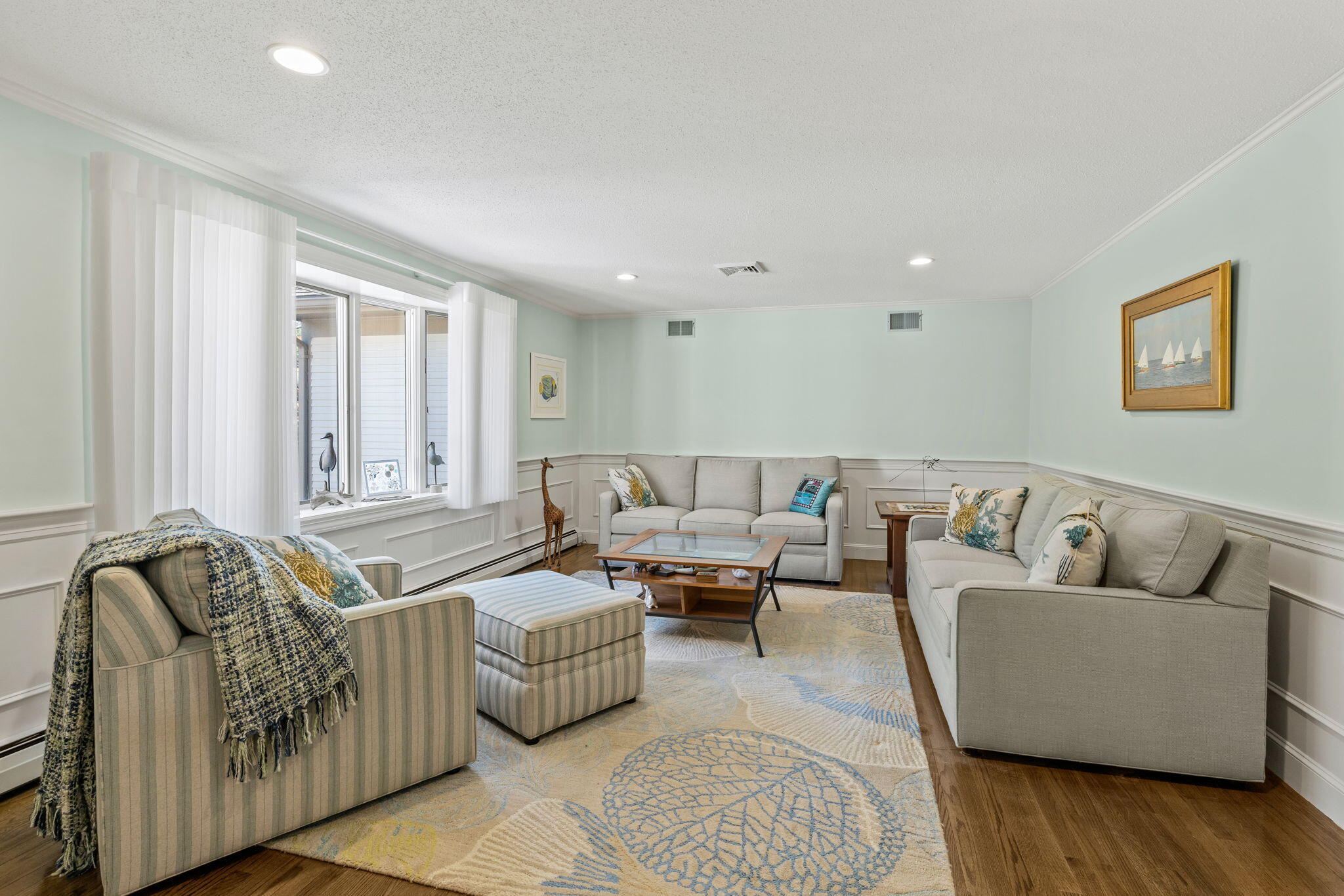 29 Amanda Court Cotuit, MA 02635 - Photo 4 of 45 a living room with furniture and wooden floor