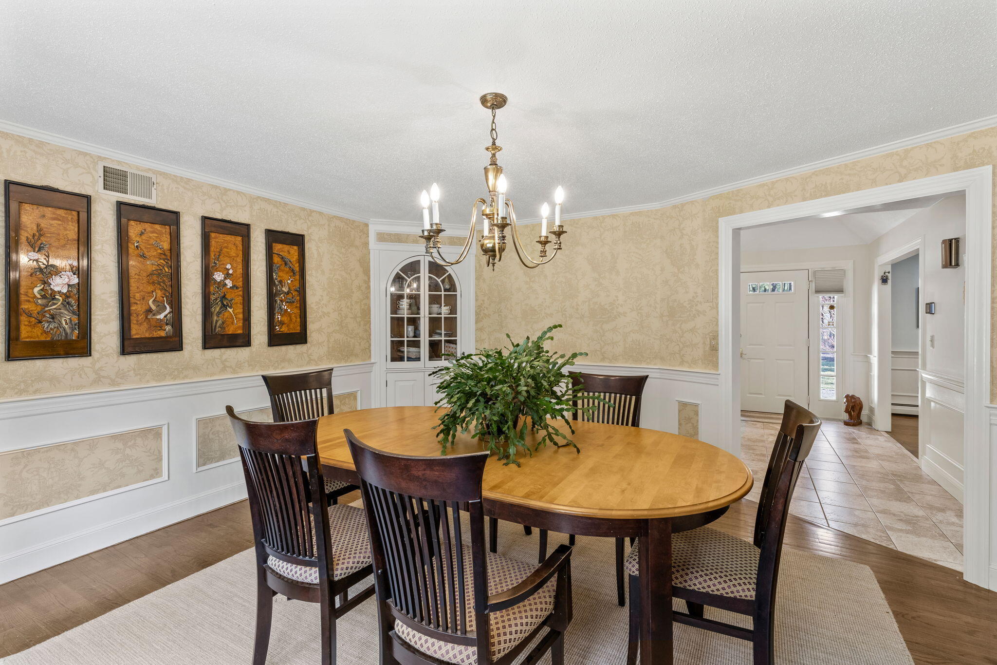 29 Amanda Court Cotuit, MA 02635 - Photo 6 of 45 a view of a dining room with furniture and chandelier