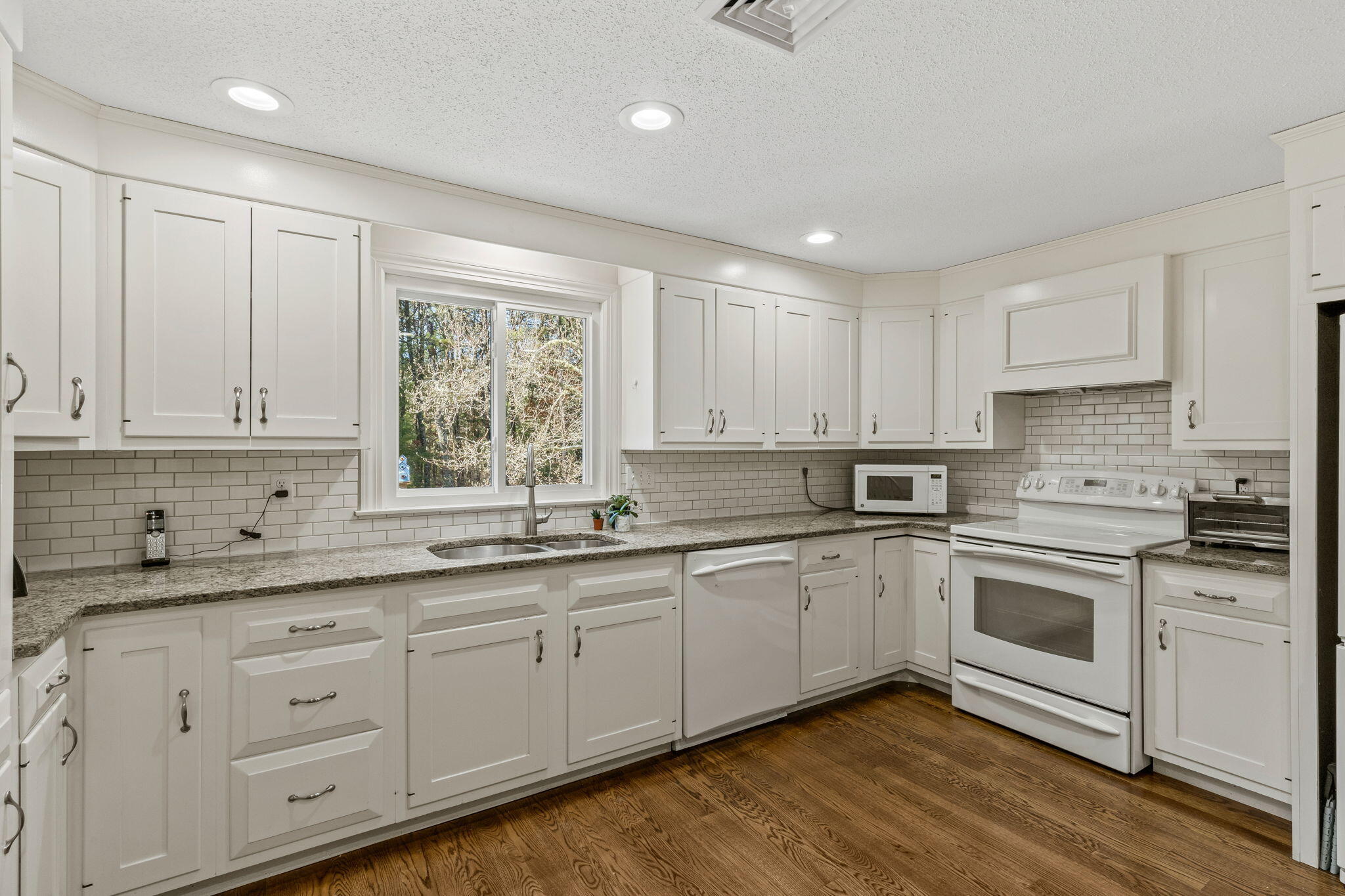 29 Amanda Court Cotuit, MA 02635 - Photo 8 of 45 a kitchen with sink cabinets and window
