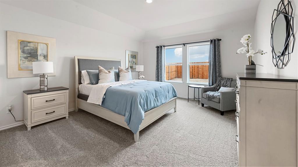 936 Jefferson Way Sherman, TX 75092 - Photo 6 of 31 a room with a bed and a couch