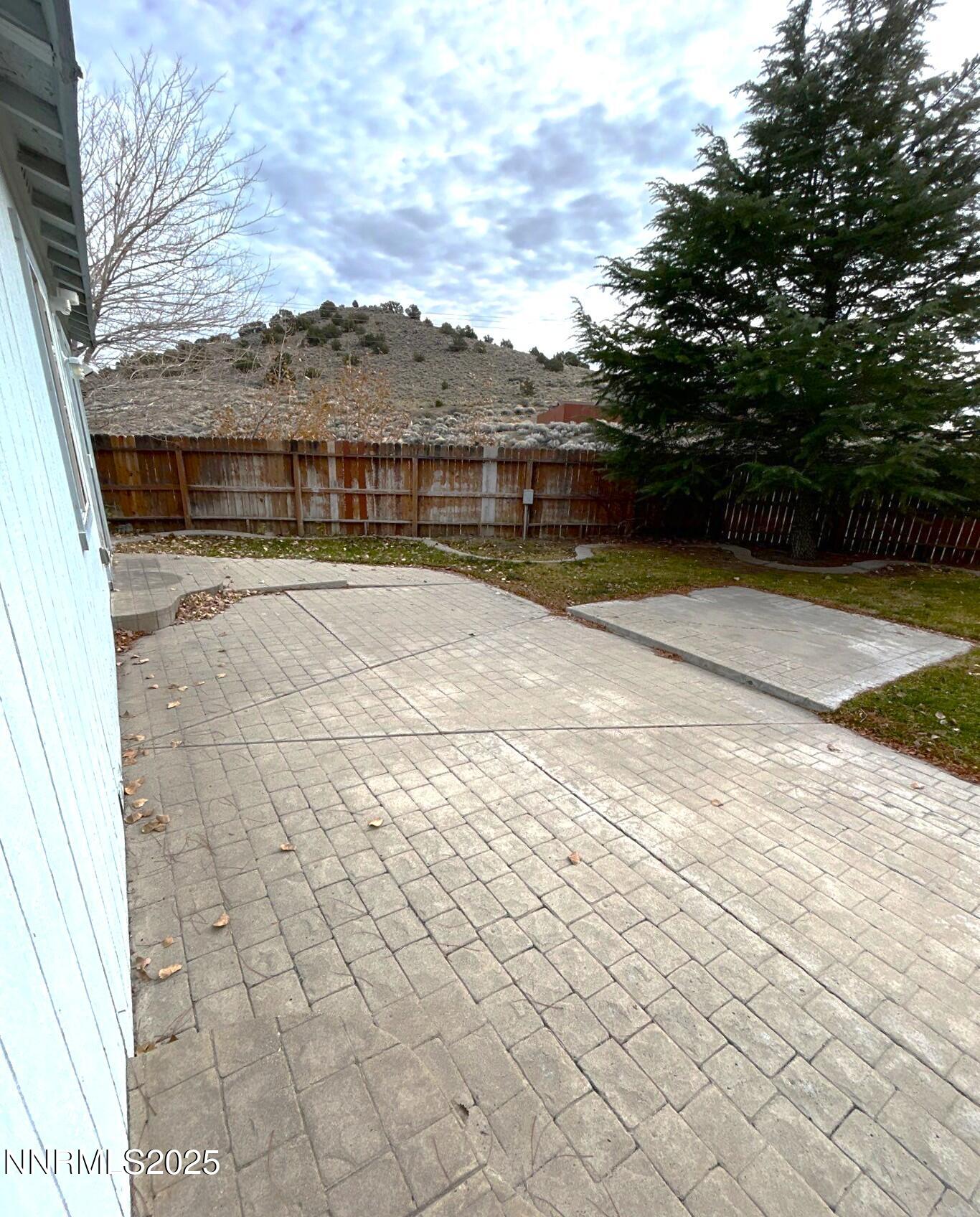 7470 Rodin Court Sun Valley, NV 89433 - Photo 18 of 23 a view of pool with outdoor seating