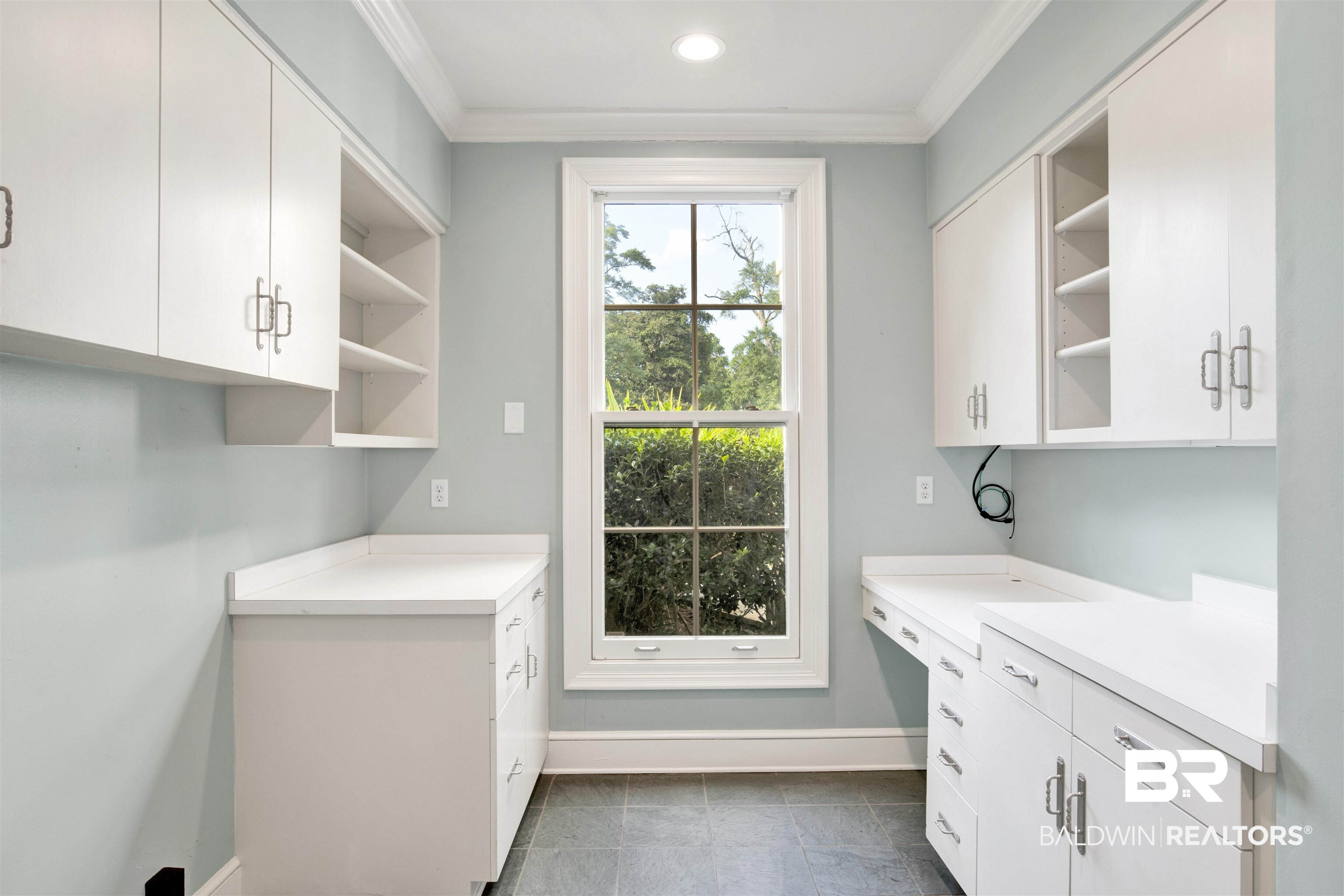 3816 Austill Lane Mobile, AL 36608 - Photo 31 of 80 Laundry area featuring crown molding, a desk, recessed lighting, and dark tile patterned floors
