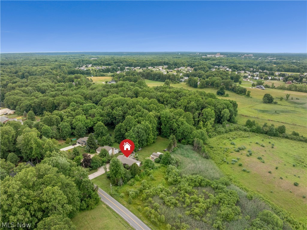 1835 Lynn Road Kent, OH 44240 - Photo 48 of 48 Expansive aerial perspective showcasing a residential property surrounded by mature trees and verdant fields