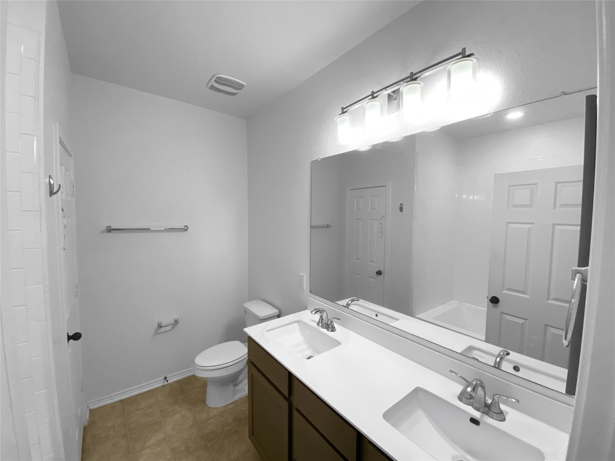 932 Yellow Ribbon Trail Jarrell, TX 76537 - Photo 11 of 26 a bathroom with a sink toilet and mirror