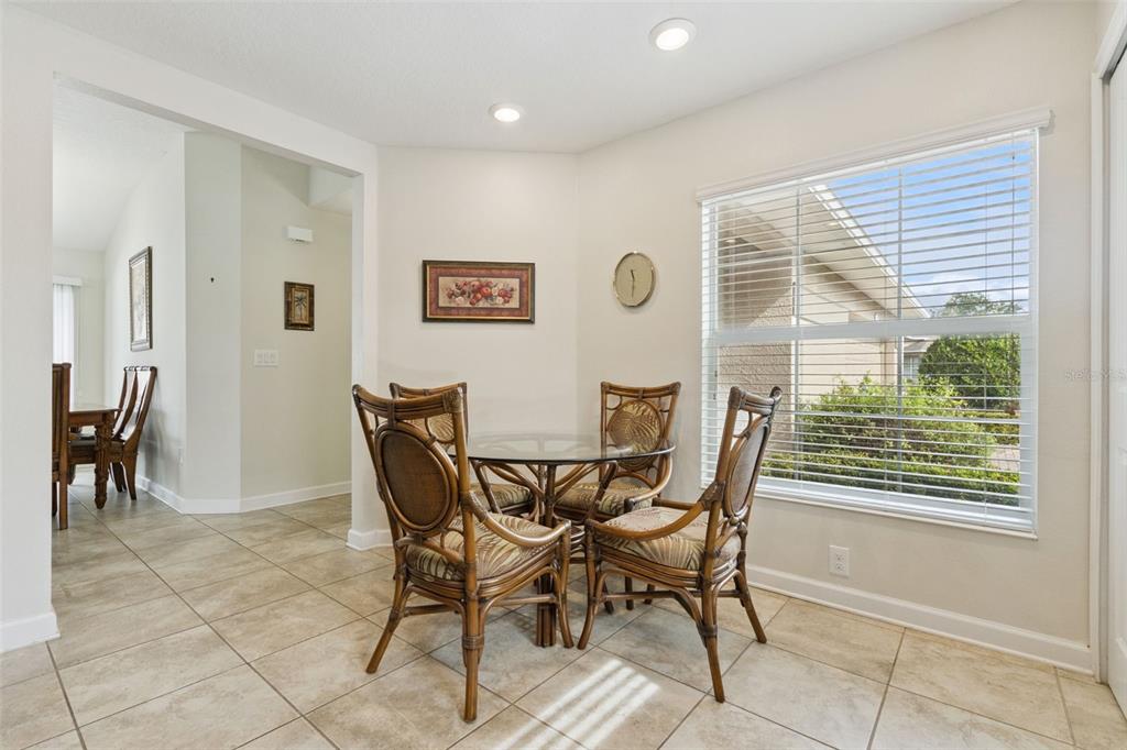 3342 Raleigh Drive Winter Haven, FL 33884 - Photo 12 of 50 a view of a dining room with furniture and a window